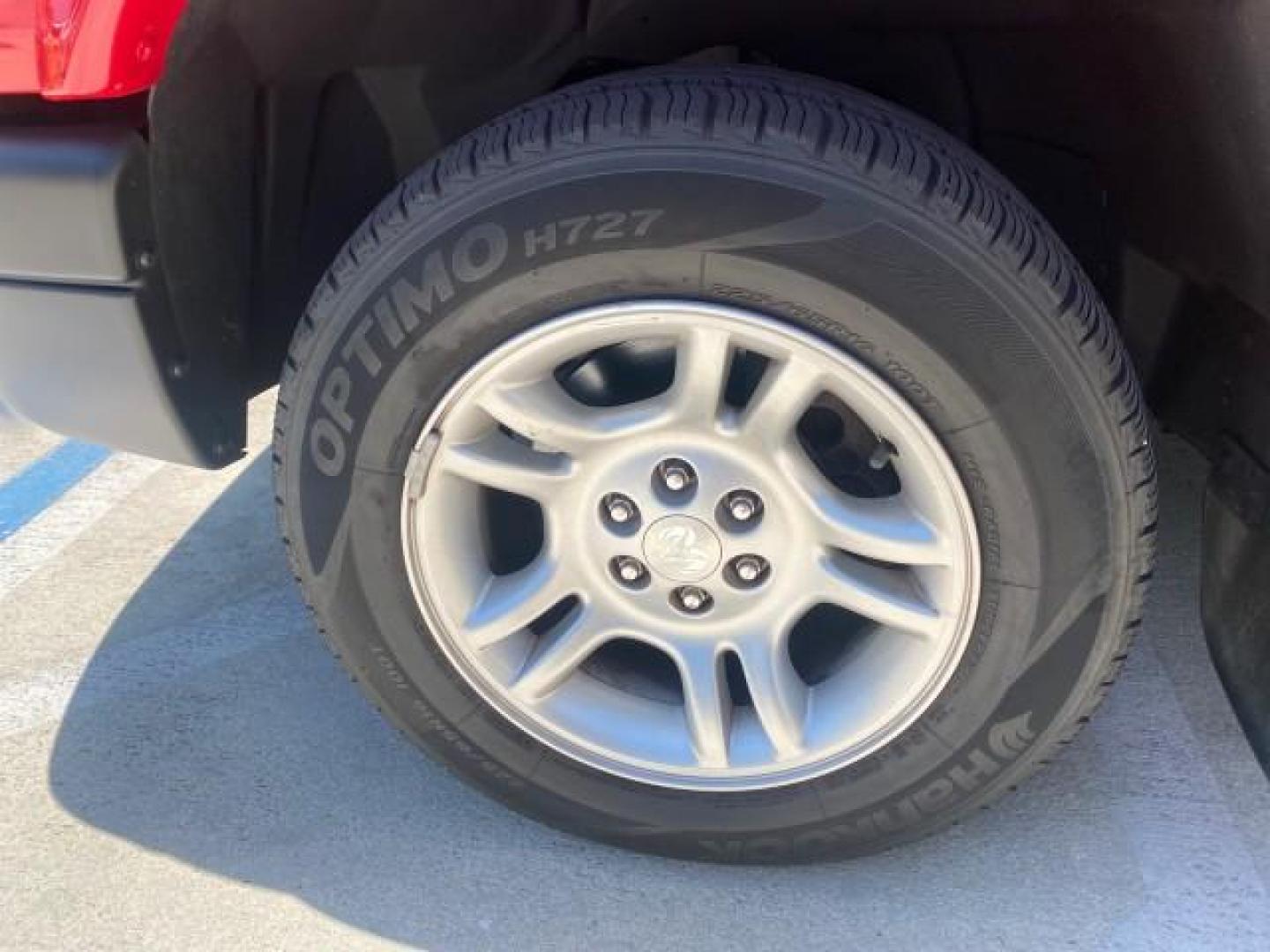 2003 Flame Red /Dark Slate Gray Dodge Dakota SXT FL OWNER LOW MILES 43,924 5 SPD (1D7FL16X43S) with an 3.9L V6 Cylinder Engine engine, Manual transmission, located at 4701 North Dixie Hwy, Pompano Beach, FL, 33064, (954) 422-2889, 26.240938, -80.123474 - OUR WEBPAGE FLORIDACARS1.COM HAS OVER 100 PHOTOS AND FREE CARFAX LINK 2003 DODGE DAKOTA VIN: 1D7FL16X43S306371 1 D 7 F L 1 6 X 4 3 S 3 0 6 3 7 1 PICKUP 75 INCH BED 3.9L V6 F OHV GASOLINE REAR WHEEL DRIVE Top Features Alloy Wheels Cloth Seats [-RETX] SXT QUICK-ORDER PKG SAVINGS *DISCOUNT* ($-1420.00) - Photo#19