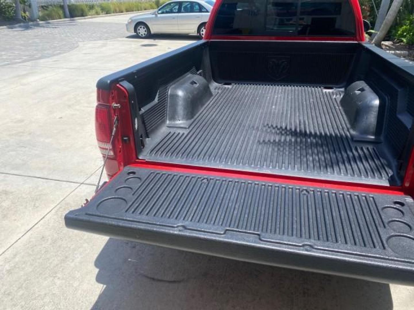 2003 Flame Red /Dark Slate Gray Dodge Dakota SXT FL OWNER LOW MILES 43,924 5 SPD (1D7FL16X43S) with an 3.9L V6 Cylinder Engine engine, Manual transmission, located at 4701 North Dixie Hwy, Pompano Beach, FL, 33064, (954) 422-2889, 26.240938, -80.123474 - OUR WEBPAGE FLORIDACARS1.COM HAS OVER 100 PHOTOS AND FREE CARFAX LINK 2003 DODGE DAKOTA VIN: 1D7FL16X43S306371 1 D 7 F L 1 6 X 4 3 S 3 0 6 3 7 1 PICKUP 75 INCH BED 3.9L V6 F OHV GASOLINE REAR WHEEL DRIVE Top Features Alloy Wheels Cloth Seats [-RETX] SXT QUICK-ORDER PKG SAVINGS *DISCOUNT* ($-1420.00) - Photo#66