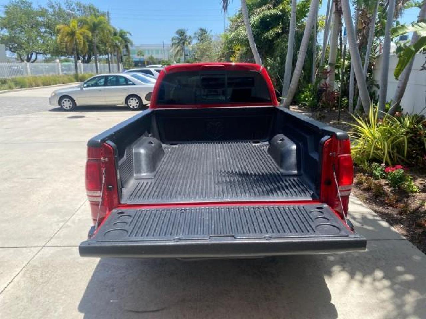 2003 Flame Red /Dark Slate Gray Dodge Dakota SXT FL OWNER LOW MILES 43,924 5 SPD (1D7FL16X43S) with an 3.9L V6 Cylinder Engine engine, Manual transmission, located at 4701 North Dixie Hwy, Pompano Beach, FL, 33064, (954) 422-2889, 26.240938, -80.123474 - OUR WEBPAGE FLORIDACARS1.COM HAS OVER 100 PHOTOS AND FREE CARFAX LINK 2003 DODGE DAKOTA VIN: 1D7FL16X43S306371 1 D 7 F L 1 6 X 4 3 S 3 0 6 3 7 1 PICKUP 75 INCH BED 3.9L V6 F OHV GASOLINE REAR WHEEL DRIVE Top Features Alloy Wheels Cloth Seats [-RETX] SXT QUICK-ORDER PKG SAVINGS *DISCOUNT* ($-1420.00) - Photo#70