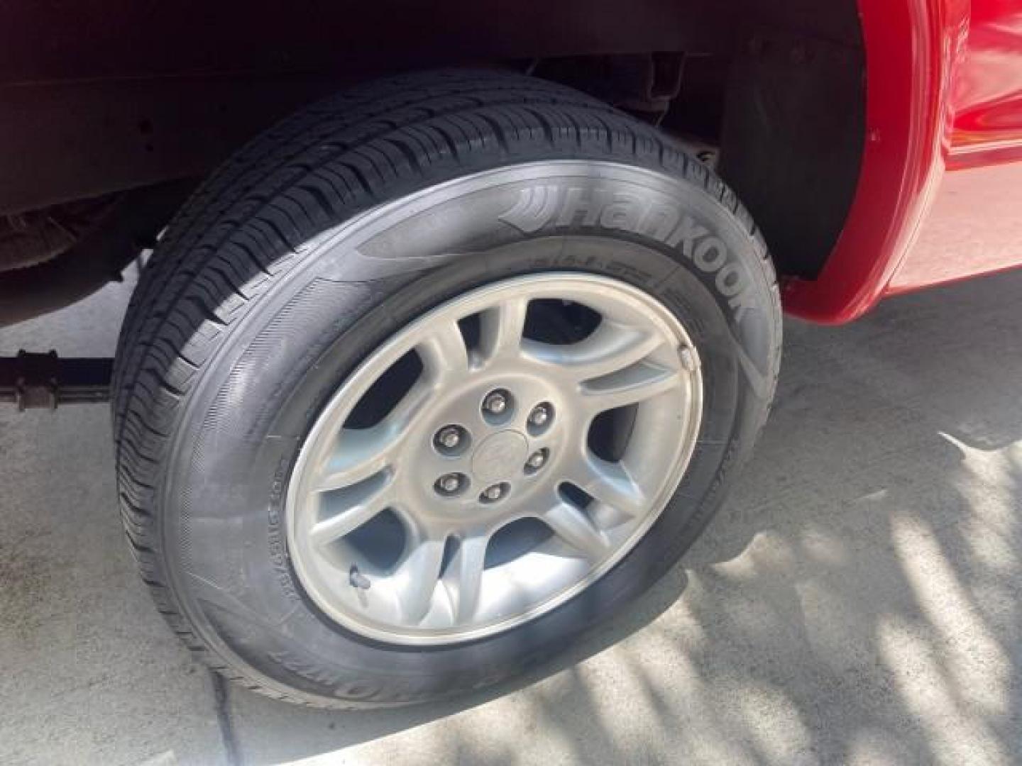 2003 Flame Red /Dark Slate Gray Dodge Dakota SXT FL OWNER LOW MILES 43,924 5 SPD (1D7FL16X43S) with an 3.9L V6 Cylinder Engine engine, Manual transmission, located at 4701 North Dixie Hwy, Pompano Beach, FL, 33064, (954) 422-2889, 26.240938, -80.123474 - OUR WEBPAGE FLORIDACARS1.COM HAS OVER 100 PHOTOS AND FREE CARFAX LINK 2003 DODGE DAKOTA VIN: 1D7FL16X43S306371 1 D 7 F L 1 6 X 4 3 S 3 0 6 3 7 1 PICKUP 75 INCH BED 3.9L V6 F OHV GASOLINE REAR WHEEL DRIVE Top Features Alloy Wheels Cloth Seats [-RETX] SXT QUICK-ORDER PKG SAVINGS *DISCOUNT* ($-1420.00) - Photo#76