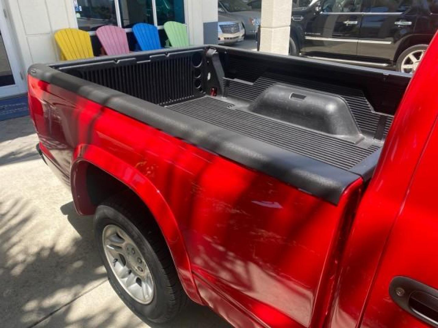 2003 Flame Red /Dark Slate Gray Dodge Dakota SXT FL OWNER LOW MILES 43,924 5 SPD (1D7FL16X43S) with an 3.9L V6 Cylinder Engine engine, Manual transmission, located at 4701 North Dixie Hwy, Pompano Beach, FL, 33064, (954) 422-2889, 26.240938, -80.123474 - OUR WEBPAGE FLORIDACARS1.COM HAS OVER 100 PHOTOS AND FREE CARFAX LINK 2003 DODGE DAKOTA VIN: 1D7FL16X43S306371 1 D 7 F L 1 6 X 4 3 S 3 0 6 3 7 1 PICKUP 75 INCH BED 3.9L V6 F OHV GASOLINE REAR WHEEL DRIVE Top Features Alloy Wheels Cloth Seats [-RETX] SXT QUICK-ORDER PKG SAVINGS *DISCOUNT* ($-1420.00) - Photo#80