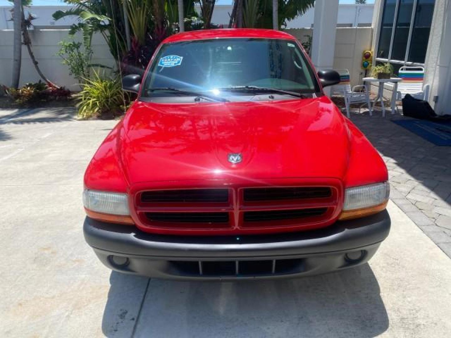 2003 Flame Red /Dark Slate Gray Dodge Dakota SXT FL OWNER LOW MILES 43,924 5 SPD (1D7FL16X43S) with an 3.9L V6 Cylinder Engine engine, Manual transmission, located at 4701 North Dixie Hwy, Pompano Beach, FL, 33064, (954) 422-2889, 26.240938, -80.123474 - OUR WEBPAGE FLORIDACARS1.COM HAS OVER 100 PHOTOS AND FREE CARFAX LINK 2003 DODGE DAKOTA VIN: 1D7FL16X43S306371 1 D 7 F L 1 6 X 4 3 S 3 0 6 3 7 1 PICKUP 75 INCH BED 3.9L V6 F OHV GASOLINE REAR WHEEL DRIVE Top Features Alloy Wheels Cloth Seats [-RETX] SXT QUICK-ORDER PKG SAVINGS *DISCOUNT* ($-1420.00) - Photo#2