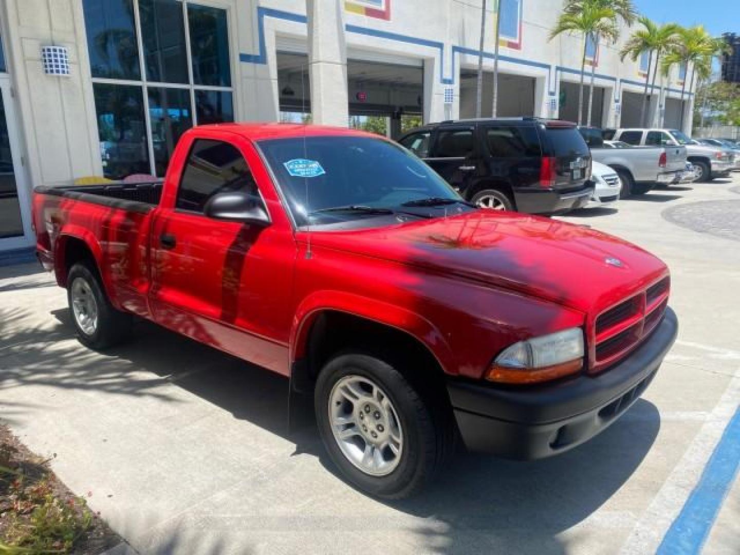 2003 Flame Red /Dark Slate Gray Dodge Dakota SXT FL OWNER LOW MILES 43,924 5 SPD (1D7FL16X43S) with an 3.9L V6 Cylinder Engine engine, Manual transmission, located at 4701 North Dixie Hwy, Pompano Beach, FL, 33064, (954) 422-2889, 26.240938, -80.123474 - OUR WEBPAGE FLORIDACARS1.COM HAS OVER 100 PHOTOS AND FREE CARFAX LINK 2003 DODGE DAKOTA VIN: 1D7FL16X43S306371 1 D 7 F L 1 6 X 4 3 S 3 0 6 3 7 1 PICKUP 75 INCH BED 3.9L V6 F OHV GASOLINE REAR WHEEL DRIVE Top Features Alloy Wheels Cloth Seats [-RETX] SXT QUICK-ORDER PKG SAVINGS *DISCOUNT* ($-1420.00) - Photo#27
