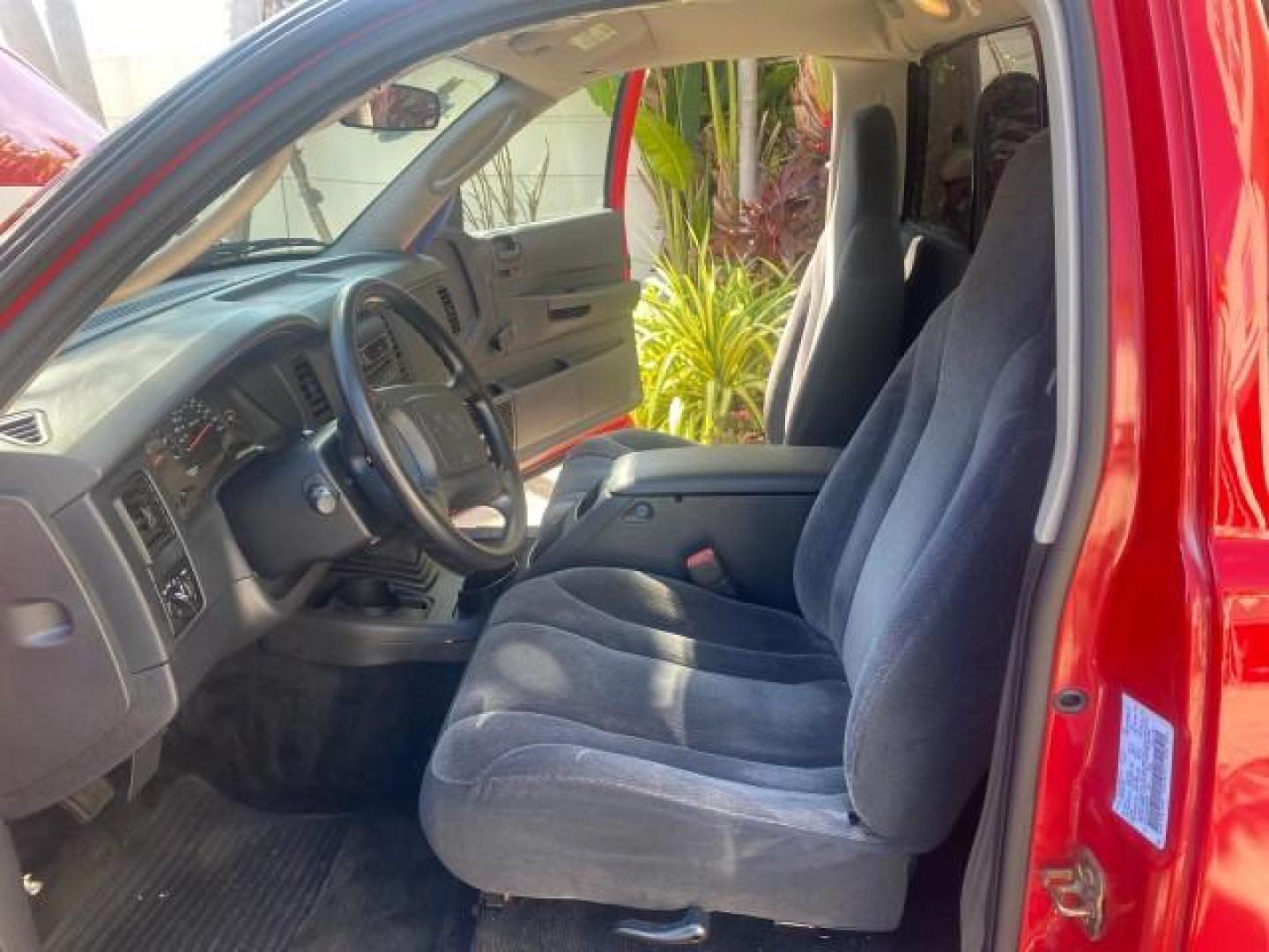 2003 Flame Red /Dark Slate Gray Dodge Dakota SXT FL OWNER LOW MILES 43,924 5 SPD (1D7FL16X43S) with an 3.9L V6 Cylinder Engine engine, Manual transmission, located at 4701 North Dixie Hwy, Pompano Beach, FL, 33064, (954) 422-2889, 26.240938, -80.123474 - OUR WEBPAGE FLORIDACARS1.COM HAS OVER 100 PHOTOS AND FREE CARFAX LINK 2003 DODGE DAKOTA VIN: 1D7FL16X43S306371 1 D 7 F L 1 6 X 4 3 S 3 0 6 3 7 1 PICKUP 75 INCH BED 3.9L V6 F OHV GASOLINE REAR WHEEL DRIVE Top Features Alloy Wheels Cloth Seats [-RETX] SXT QUICK-ORDER PKG SAVINGS *DISCOUNT* ($-1420.00) - Photo#10