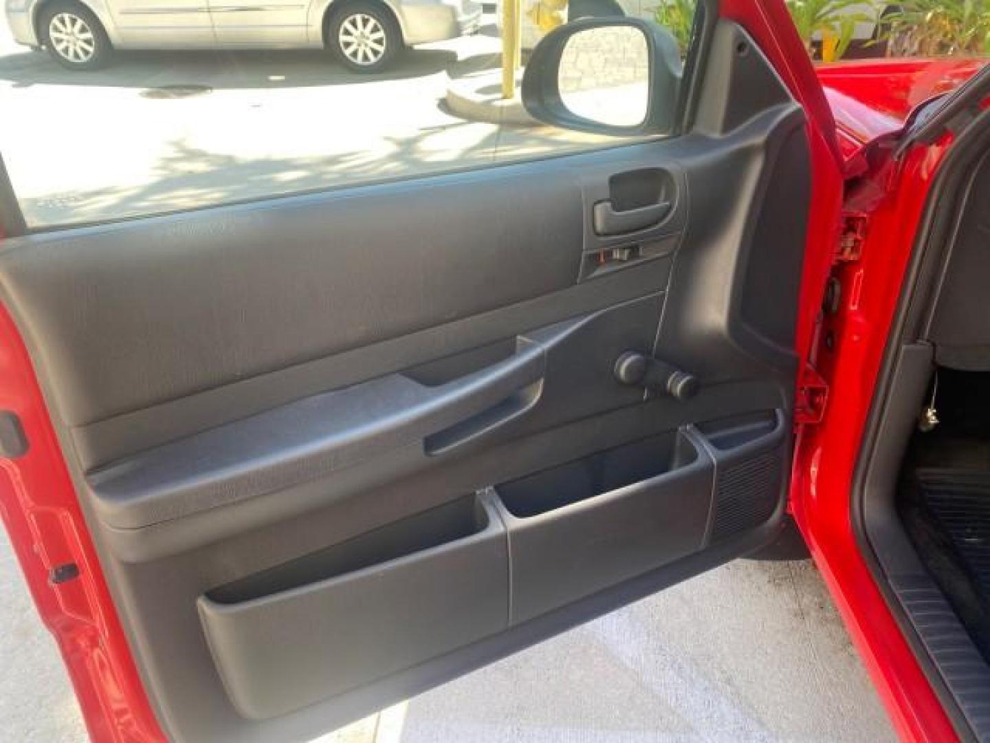 2003 Flame Red /Dark Slate Gray Dodge Dakota SXT FL OWNER LOW MILES 43,924 5 SPD (1D7FL16X43S) with an 3.9L V6 Cylinder Engine engine, Manual transmission, located at 4701 North Dixie Hwy, Pompano Beach, FL, 33064, (954) 422-2889, 26.240938, -80.123474 - OUR WEBPAGE FLORIDACARS1.COM HAS OVER 100 PHOTOS AND FREE CARFAX LINK 2003 DODGE DAKOTA VIN: 1D7FL16X43S306371 1 D 7 F L 1 6 X 4 3 S 3 0 6 3 7 1 PICKUP 75 INCH BED 3.9L V6 F OHV GASOLINE REAR WHEEL DRIVE Top Features Alloy Wheels Cloth Seats [-RETX] SXT QUICK-ORDER PKG SAVINGS *DISCOUNT* ($-1420.00) - Photo#32