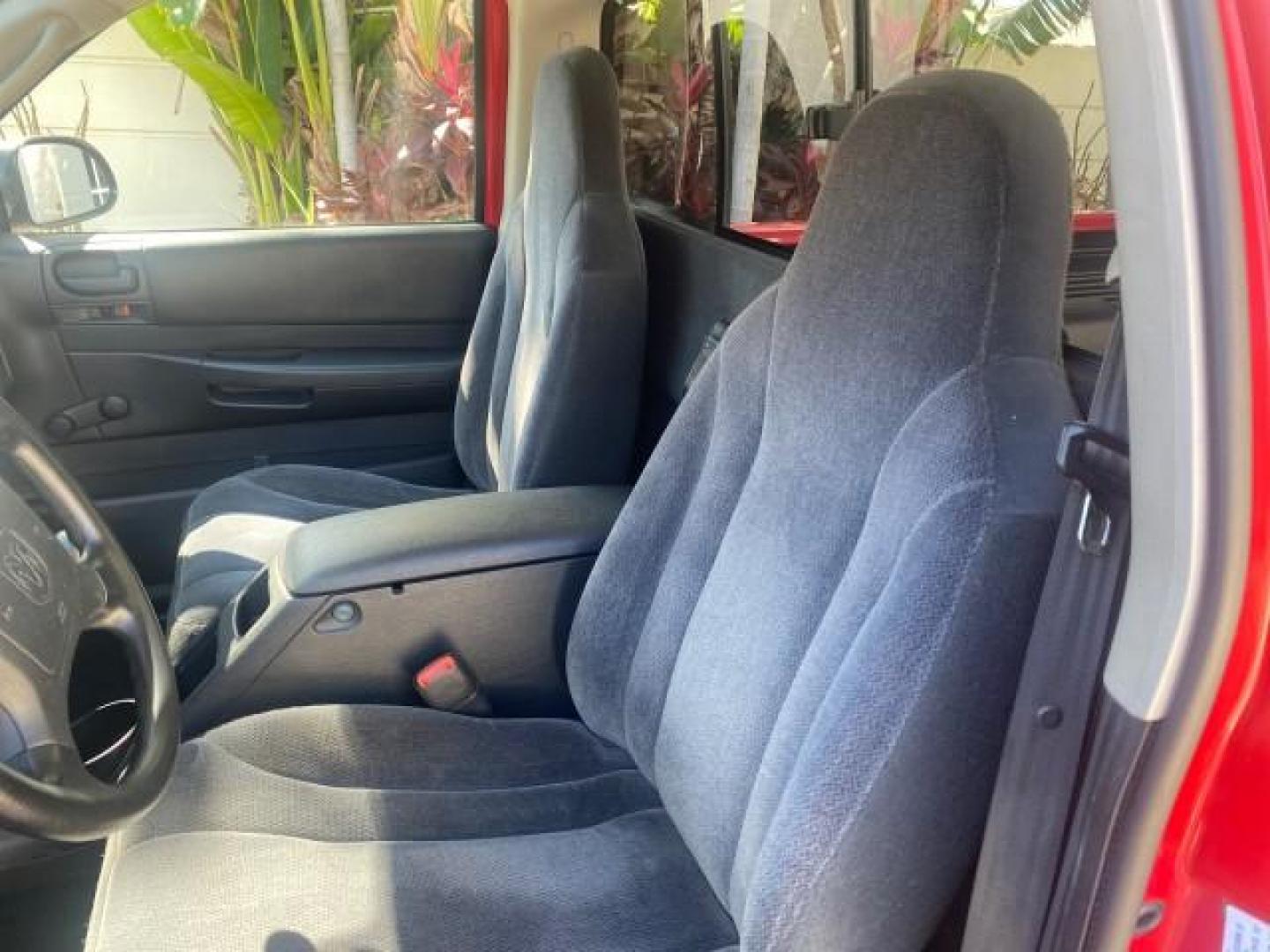 2003 Flame Red /Dark Slate Gray Dodge Dakota SXT FL OWNER LOW MILES 43,924 5 SPD (1D7FL16X43S) with an 3.9L V6 Cylinder Engine engine, Manual transmission, located at 4701 North Dixie Hwy, Pompano Beach, FL, 33064, (954) 422-2889, 26.240938, -80.123474 - OUR WEBPAGE FLORIDACARS1.COM HAS OVER 100 PHOTOS AND FREE CARFAX LINK 2003 DODGE DAKOTA VIN: 1D7FL16X43S306371 1 D 7 F L 1 6 X 4 3 S 3 0 6 3 7 1 PICKUP 75 INCH BED 3.9L V6 F OHV GASOLINE REAR WHEEL DRIVE Top Features Alloy Wheels Cloth Seats [-RETX] SXT QUICK-ORDER PKG SAVINGS *DISCOUNT* ($-1420.00) - Photo#33