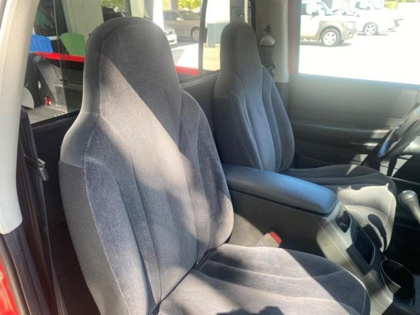 2003 Flame Red /Dark Slate Gray Dodge Dakota SXT FL OWNER LOW MILES 43,924 5 SPD (1D7FL16X43S) with an 3.9L V6 Cylinder Engine engine, Manual transmission, located at 4701 North Dixie Hwy, Pompano Beach, FL, 33064, (954) 422-2889, 26.240938, -80.123474 - OUR WEBPAGE FLORIDACARS1.COM HAS OVER 100 PHOTOS AND FREE CARFAX LINK 2003 DODGE DAKOTA VIN: 1D7FL16X43S306371 1 D 7 F L 1 6 X 4 3 S 3 0 6 3 7 1 PICKUP 75 INCH BED 3.9L V6 F OHV GASOLINE REAR WHEEL DRIVE Top Features Alloy Wheels Cloth Seats [-RETX] SXT QUICK-ORDER PKG SAVINGS *DISCOUNT* ($-1420.00) - Photo#89
