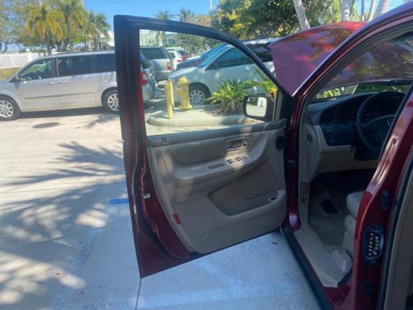 2004 Redrock Pearl /Ivory Honda Odyssey EX-L 1 OWNER FL LOW MILES 59,680 (5FNRL18994B) with an 3.5L SOHC MPFI 24-Valve VTEC V6 Engine engine, Automatic transmission, located at 4701 North Dixie Hwy, Pompano Beach, FL, 33064, (954) 422-2889, 26.240938, -80.123474 - OUR WEBPAGE FLORIDACARS1.COM HAS OVER 100 PHOTOS AND FREE CARFAX LINK 2004 HONDA ODYSSEY EX-L NO RECALLS VIN: 5FNRL18994B039314 5 F N R L 1 8 9 9 4 B 0 3 9 3 1 4 VAN 3.5L V6 F SOHC GASOLINE FRONT WHEEL DRIVE Alloy Wheels Quad Seats Fold-Away Third Row Rear Air Conditioning Leather Seats Third Row Se - Photo#9