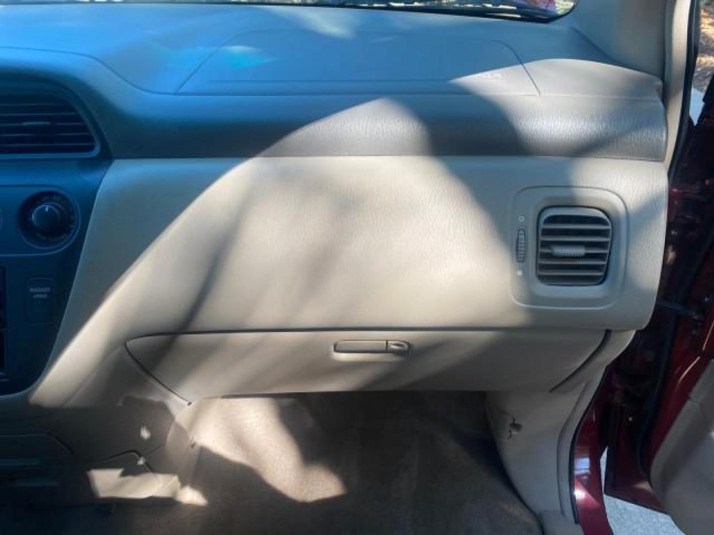 2004 Redrock Pearl /Ivory Honda Odyssey EX-L 1 OWNER FL LOW MILES 59,680 (5FNRL18994B) with an 3.5L SOHC MPFI 24-Valve VTEC V6 Engine engine, Automatic transmission, located at 4701 North Dixie Hwy, Pompano Beach, FL, 33064, (954) 422-2889, 26.240938, -80.123474 - OUR WEBPAGE FLORIDACARS1.COM HAS OVER 100 PHOTOS AND FREE CARFAX LINK 2004 HONDA ODYSSEY EX-L NO RECALLS VIN: 5FNRL18994B039314 5 F N R L 1 8 9 9 4 B 0 3 9 3 1 4 VAN 3.5L V6 F SOHC GASOLINE FRONT WHEEL DRIVE Alloy Wheels Quad Seats Fold-Away Third Row Rear Air Conditioning Leather Seats Third Row Se - Photo#99