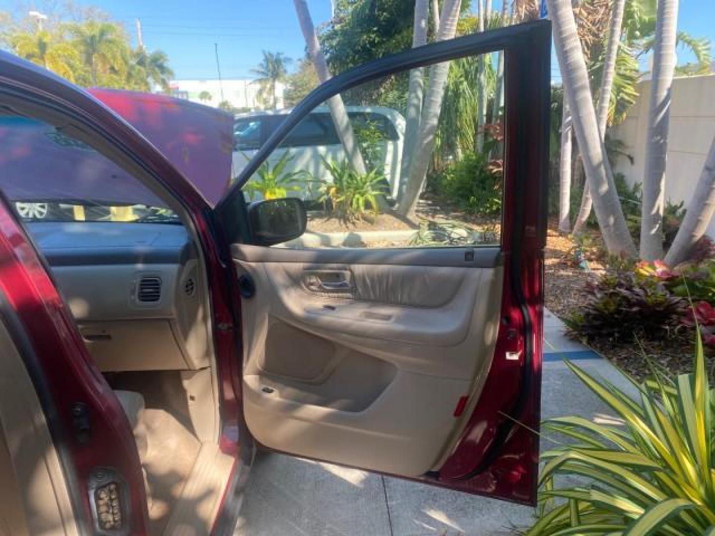 2004 Redrock Pearl /Ivory Honda Odyssey EX-L 1 OWNER FL LOW MILES 59,680 (5FNRL18994B) with an 3.5L SOHC MPFI 24-Valve VTEC V6 Engine engine, Automatic transmission, located at 4701 North Dixie Hwy, Pompano Beach, FL, 33064, (954) 422-2889, 26.240938, -80.123474 - OUR WEBPAGE FLORIDACARS1.COM HAS OVER 100 PHOTOS AND FREE CARFAX LINK 2004 HONDA ODYSSEY EX-L NO RECALLS VIN: 5FNRL18994B039314 5 F N R L 1 8 9 9 4 B 0 3 9 3 1 4 VAN 3.5L V6 F SOHC GASOLINE FRONT WHEEL DRIVE Alloy Wheels Quad Seats Fold-Away Third Row Rear Air Conditioning Leather Seats Third Row Se - Photo#11