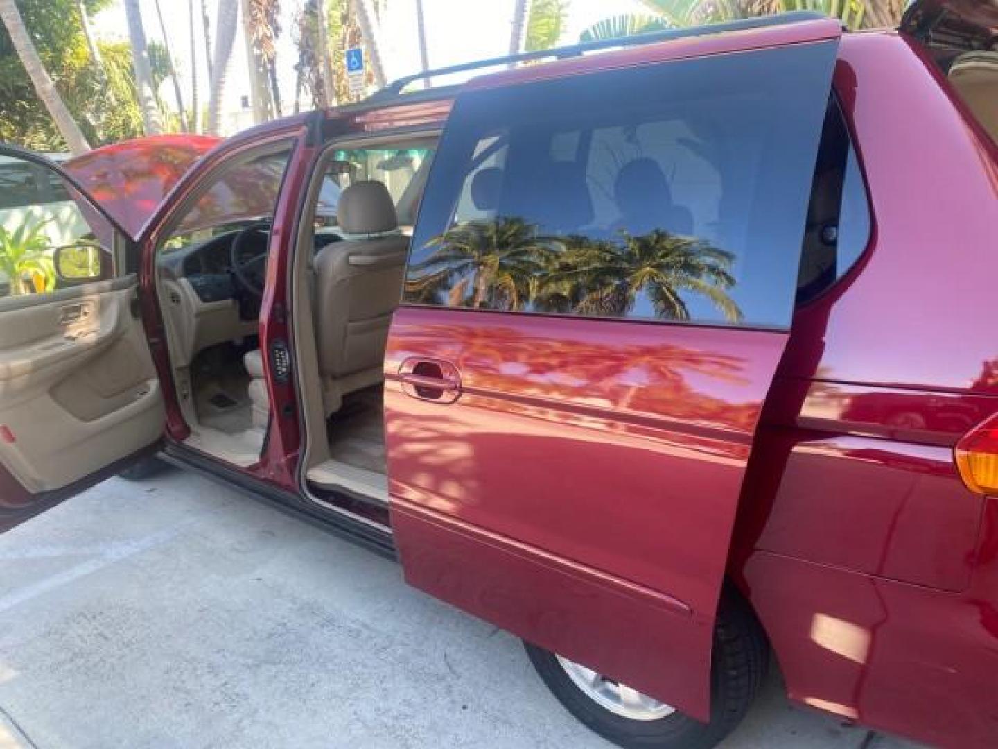 2004 Redrock Pearl /Ivory Honda Odyssey EX-L 1 OWNER FL LOW MILES 59,680 (5FNRL18994B) with an 3.5L SOHC MPFI 24-Valve VTEC V6 Engine engine, Automatic transmission, located at 4701 North Dixie Hwy, Pompano Beach, FL, 33064, (954) 422-2889, 26.240938, -80.123474 - OUR WEBPAGE FLORIDACARS1.COM HAS OVER 100 PHOTOS AND FREE CARFAX LINK 2004 HONDA ODYSSEY EX-L NO RECALLS VIN: 5FNRL18994B039314 5 F N R L 1 8 9 9 4 B 0 3 9 3 1 4 VAN 3.5L V6 F SOHC GASOLINE FRONT WHEEL DRIVE Alloy Wheels Quad Seats Fold-Away Third Row Rear Air Conditioning Leather Seats Third Row Se - Photo#13