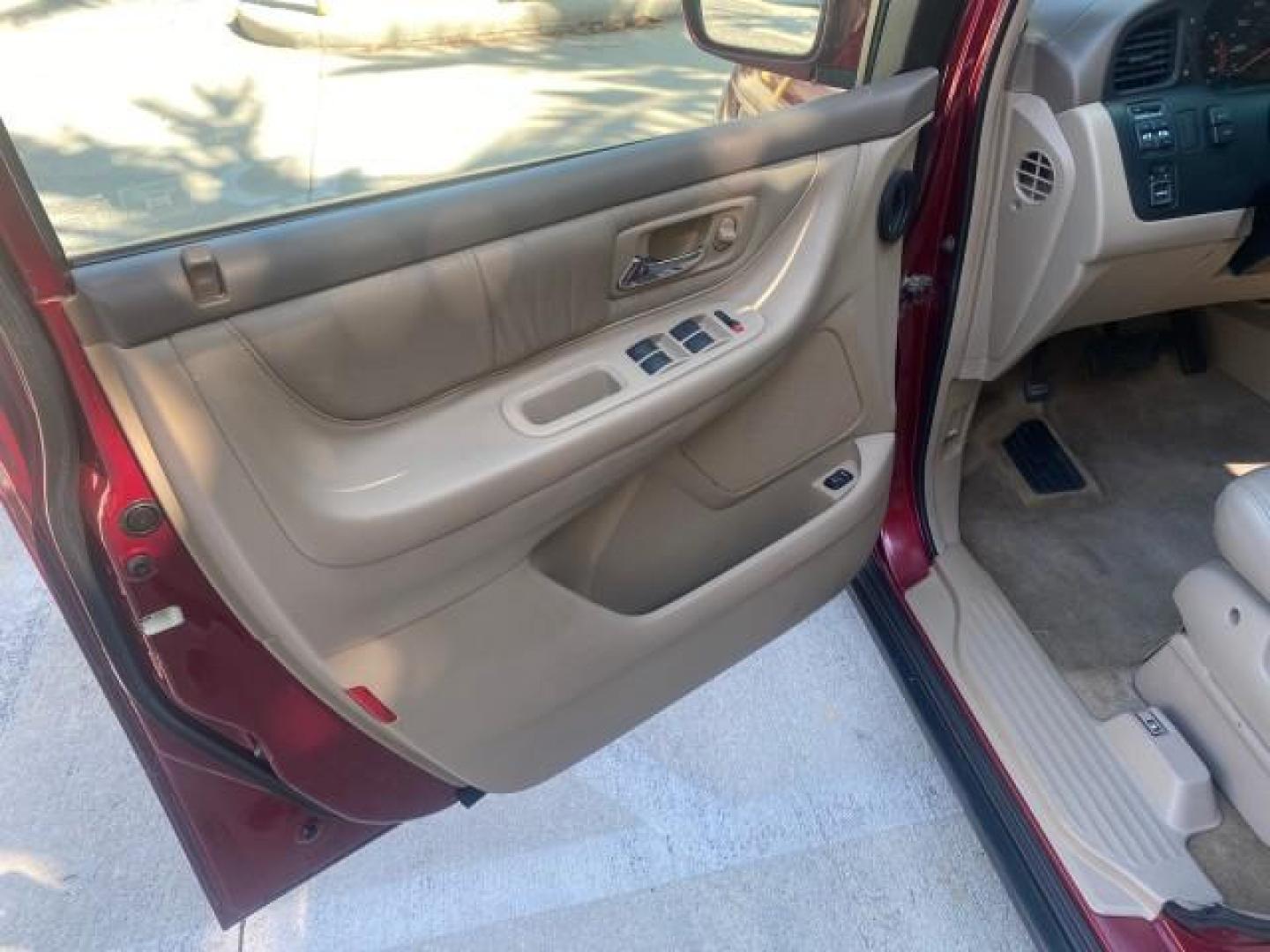 2004 Redrock Pearl /Ivory Honda Odyssey EX-L 1 OWNER FL LOW MILES 59,680 (5FNRL18994B) with an 3.5L SOHC MPFI 24-Valve VTEC V6 Engine engine, Automatic transmission, located at 4701 North Dixie Hwy, Pompano Beach, FL, 33064, (954) 422-2889, 26.240938, -80.123474 - OUR WEBPAGE FLORIDACARS1.COM HAS OVER 100 PHOTOS AND FREE CARFAX LINK 2004 HONDA ODYSSEY EX-L NO RECALLS VIN: 5FNRL18994B039314 5 F N R L 1 8 9 9 4 B 0 3 9 3 1 4 VAN 3.5L V6 F SOHC GASOLINE FRONT WHEEL DRIVE Alloy Wheels Quad Seats Fold-Away Third Row Rear Air Conditioning Leather Seats Third Row Se - Photo#26