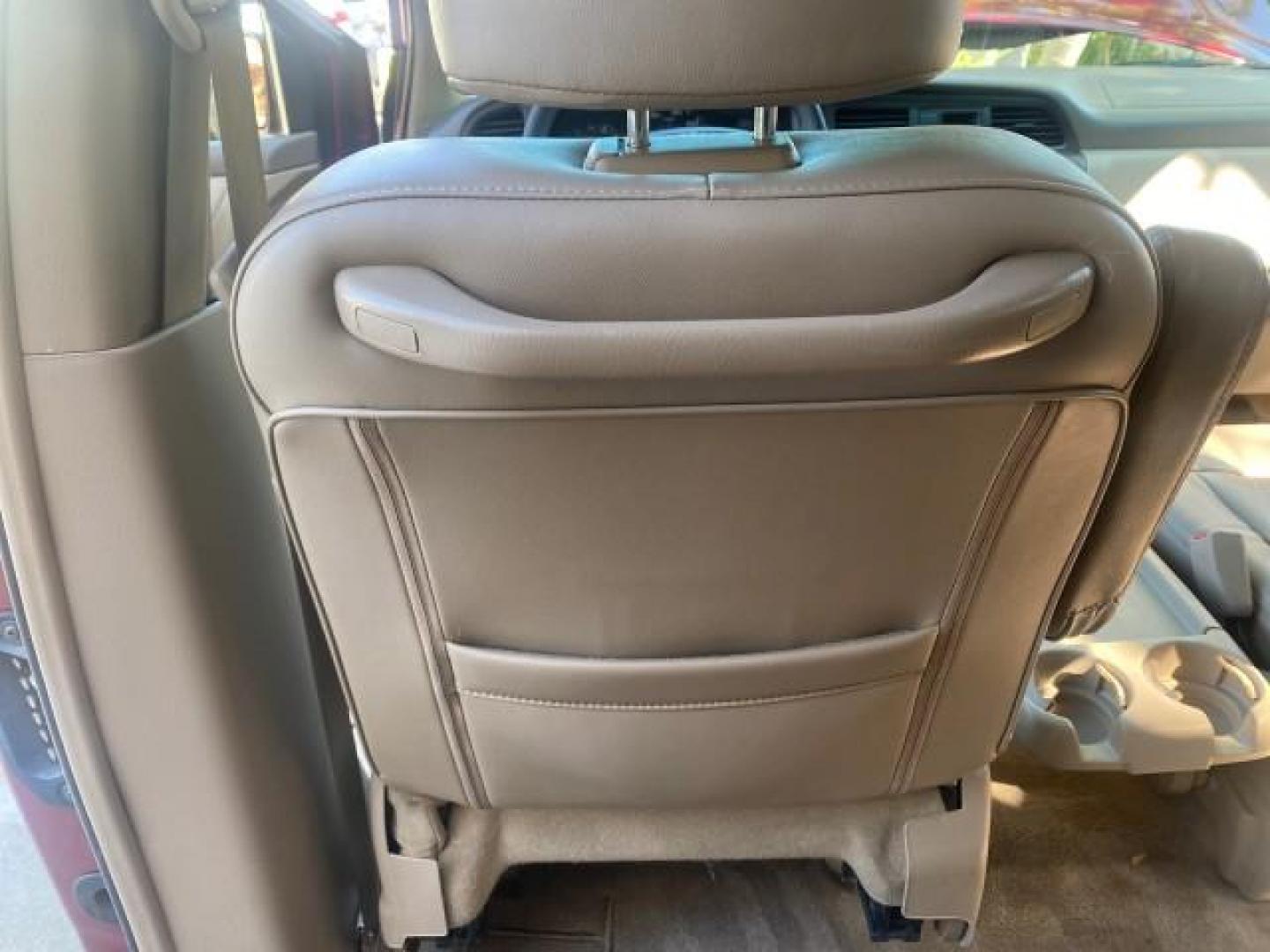 2004 Redrock Pearl /Ivory Honda Odyssey EX-L 1 OWNER FL LOW MILES 59,680 (5FNRL18994B) with an 3.5L SOHC MPFI 24-Valve VTEC V6 Engine engine, Automatic transmission, located at 4701 North Dixie Hwy, Pompano Beach, FL, 33064, (954) 422-2889, 26.240938, -80.123474 - OUR WEBPAGE FLORIDACARS1.COM HAS OVER 100 PHOTOS AND FREE CARFAX LINK 2004 HONDA ODYSSEY EX-L NO RECALLS VIN: 5FNRL18994B039314 5 F N R L 1 8 9 9 4 B 0 3 9 3 1 4 VAN 3.5L V6 F SOHC GASOLINE FRONT WHEEL DRIVE Alloy Wheels Quad Seats Fold-Away Third Row Rear Air Conditioning Leather Seats Third Row Se - Photo#59
