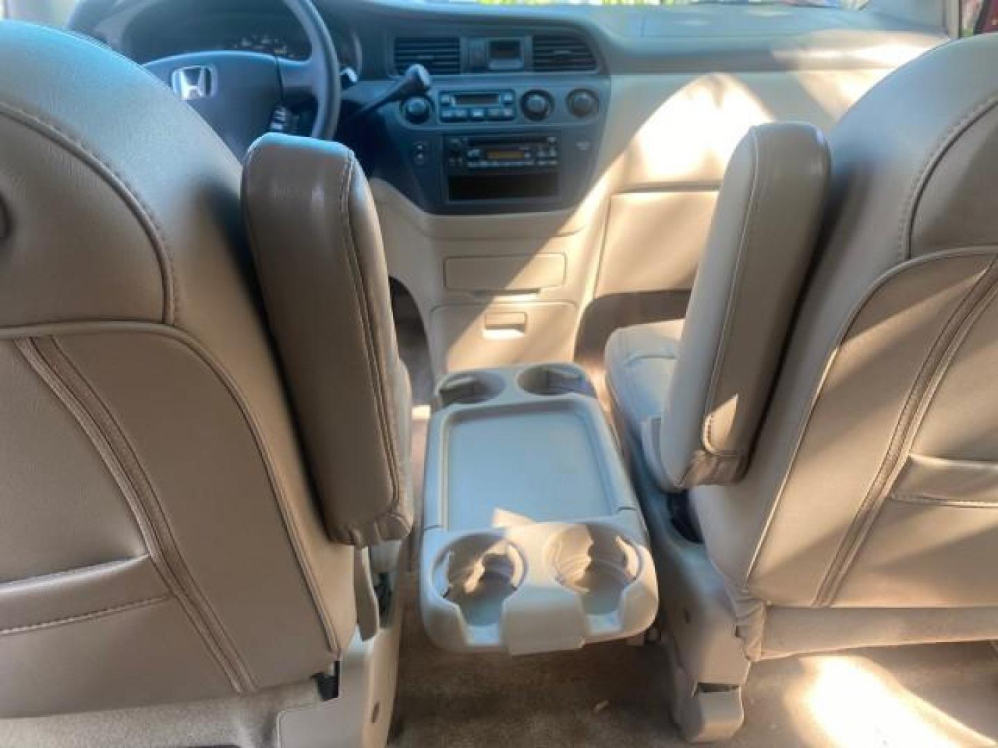 2004 Redrock Pearl /Ivory Honda Odyssey EX-L 1 OWNER FL LOW MILES 59,680 (5FNRL18994B) with an 3.5L SOHC MPFI 24-Valve VTEC V6 Engine engine, Automatic transmission, located at 4701 North Dixie Hwy, Pompano Beach, FL, 33064, (954) 422-2889, 26.240938, -80.123474 - OUR WEBPAGE FLORIDACARS1.COM HAS OVER 100 PHOTOS AND FREE CARFAX LINK 2004 HONDA ODYSSEY EX-L NO RECALLS VIN: 5FNRL18994B039314 5 F N R L 1 8 9 9 4 B 0 3 9 3 1 4 VAN 3.5L V6 F SOHC GASOLINE FRONT WHEEL DRIVE Alloy Wheels Quad Seats Fold-Away Third Row Rear Air Conditioning Leather Seats Third Row Se - Photo#61