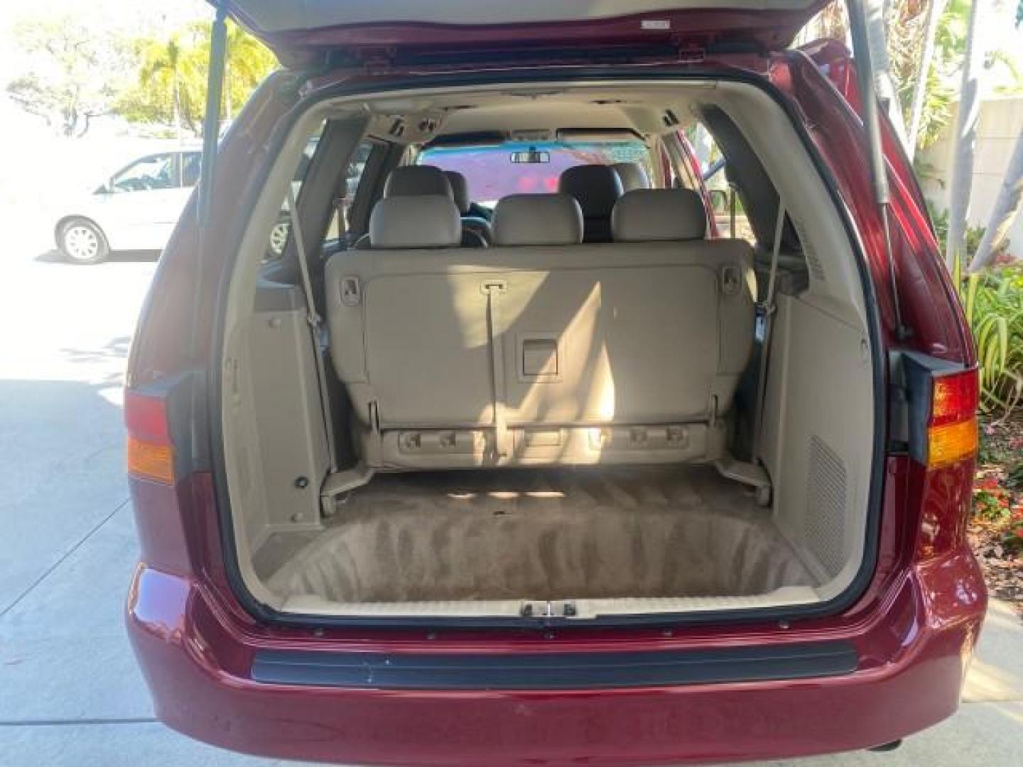 2004 Redrock Pearl /Ivory Honda Odyssey EX-L 1 OWNER FL LOW MILES 59,680 (5FNRL18994B) with an 3.5L SOHC MPFI 24-Valve VTEC V6 Engine engine, Automatic transmission, located at 4701 North Dixie Hwy, Pompano Beach, FL, 33064, (954) 422-2889, 26.240938, -80.123474 - OUR WEBPAGE FLORIDACARS1.COM HAS OVER 100 PHOTOS AND FREE CARFAX LINK 2004 HONDA ODYSSEY EX-L NO RECALLS VIN: 5FNRL18994B039314 5 F N R L 1 8 9 9 4 B 0 3 9 3 1 4 VAN 3.5L V6 F SOHC GASOLINE FRONT WHEEL DRIVE Alloy Wheels Quad Seats Fold-Away Third Row Rear Air Conditioning Leather Seats Third Row Se - Photo#73