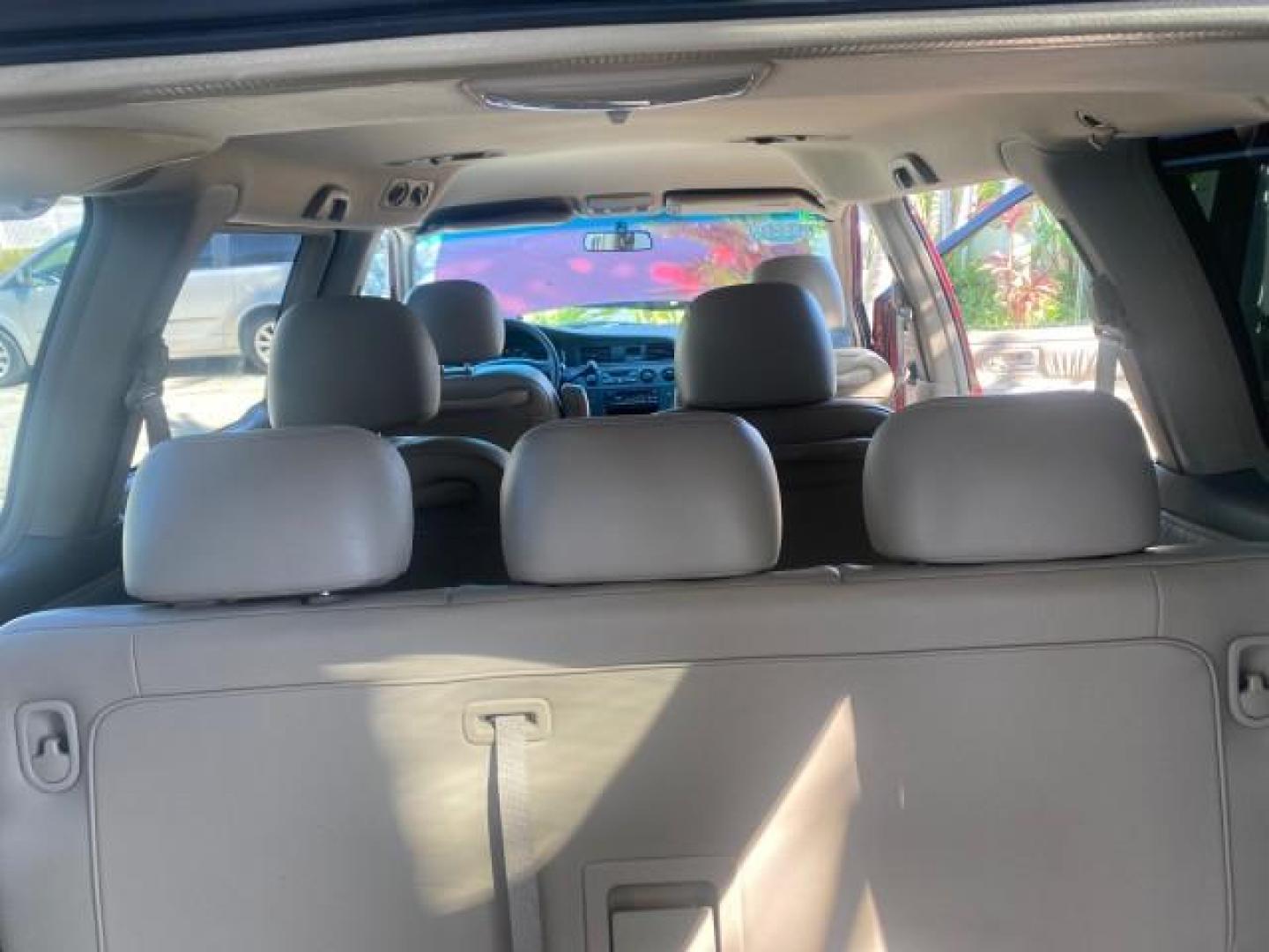 2004 Redrock Pearl /Ivory Honda Odyssey EX-L 1 OWNER FL LOW MILES 59,680 (5FNRL18994B) with an 3.5L SOHC MPFI 24-Valve VTEC V6 Engine engine, Automatic transmission, located at 4701 North Dixie Hwy, Pompano Beach, FL, 33064, (954) 422-2889, 26.240938, -80.123474 - OUR WEBPAGE FLORIDACARS1.COM HAS OVER 100 PHOTOS AND FREE CARFAX LINK 2004 HONDA ODYSSEY EX-L NO RECALLS VIN: 5FNRL18994B039314 5 F N R L 1 8 9 9 4 B 0 3 9 3 1 4 VAN 3.5L V6 F SOHC GASOLINE FRONT WHEEL DRIVE Alloy Wheels Quad Seats Fold-Away Third Row Rear Air Conditioning Leather Seats Third Row Se - Photo#75