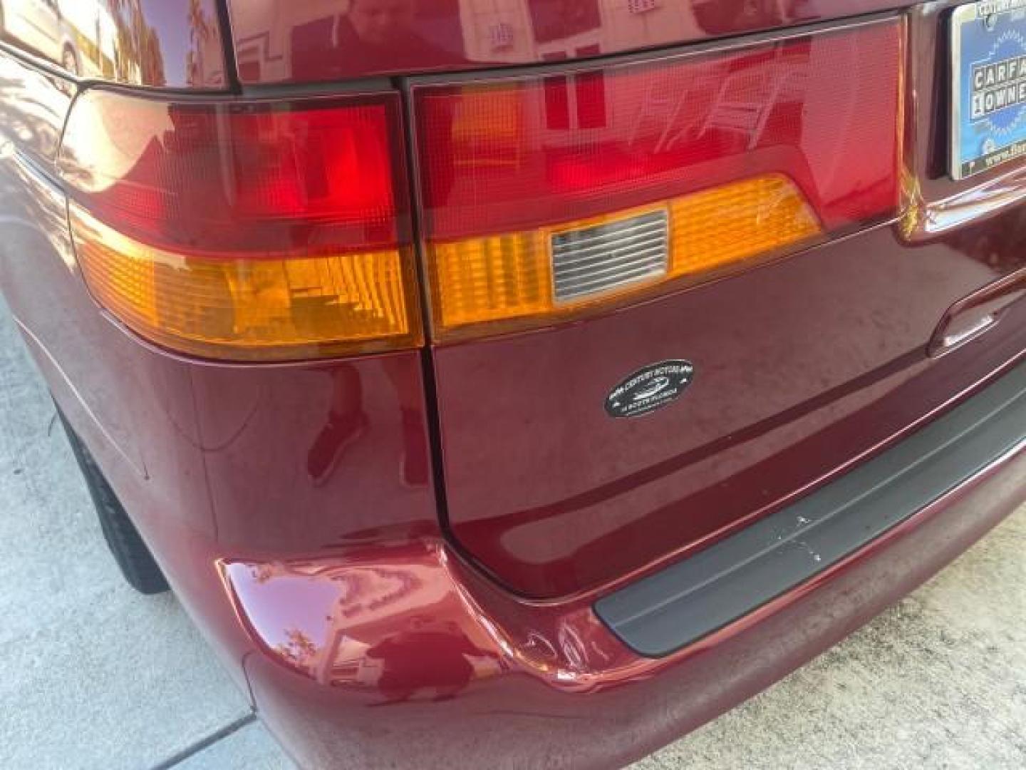 2004 Redrock Pearl /Ivory Honda Odyssey EX-L 1 OWNER FL LOW MILES 59,680 (5FNRL18994B) with an 3.5L SOHC MPFI 24-Valve VTEC V6 Engine engine, Automatic transmission, located at 4701 North Dixie Hwy, Pompano Beach, FL, 33064, (954) 422-2889, 26.240938, -80.123474 - OUR WEBPAGE FLORIDACARS1.COM HAS OVER 100 PHOTOS AND FREE CARFAX LINK 2004 HONDA ODYSSEY EX-L NO RECALLS VIN: 5FNRL18994B039314 5 F N R L 1 8 9 9 4 B 0 3 9 3 1 4 VAN 3.5L V6 F SOHC GASOLINE FRONT WHEEL DRIVE Alloy Wheels Quad Seats Fold-Away Third Row Rear Air Conditioning Leather Seats Third Row Se - Photo#76