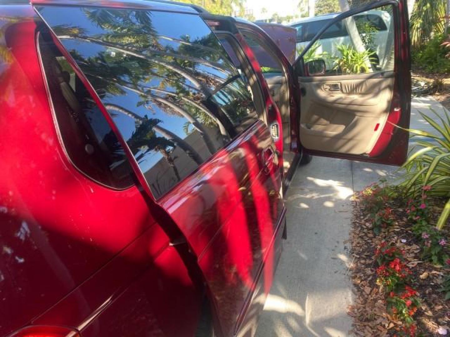2004 Redrock Pearl /Ivory Honda Odyssey EX-L 1 OWNER FL LOW MILES 59,680 (5FNRL18994B) with an 3.5L SOHC MPFI 24-Valve VTEC V6 Engine engine, Automatic transmission, located at 4701 North Dixie Hwy, Pompano Beach, FL, 33064, (954) 422-2889, 26.240938, -80.123474 - OUR WEBPAGE FLORIDACARS1.COM HAS OVER 100 PHOTOS AND FREE CARFAX LINK 2004 HONDA ODYSSEY EX-L NO RECALLS VIN: 5FNRL18994B039314 5 F N R L 1 8 9 9 4 B 0 3 9 3 1 4 VAN 3.5L V6 F SOHC GASOLINE FRONT WHEEL DRIVE Alloy Wheels Quad Seats Fold-Away Third Row Rear Air Conditioning Leather Seats Third Row Se - Photo#82