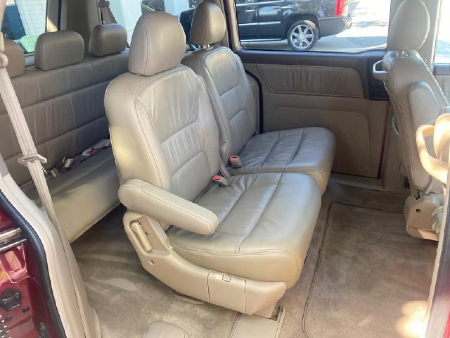 2004 Redrock Pearl /Ivory Honda Odyssey EX-L 1 OWNER FL LOW MILES 59,680 (5FNRL18994B) with an 3.5L SOHC MPFI 24-Valve VTEC V6 Engine engine, Automatic transmission, located at 4701 North Dixie Hwy, Pompano Beach, FL, 33064, (954) 422-2889, 26.240938, -80.123474 - OUR WEBPAGE FLORIDACARS1.COM HAS OVER 100 PHOTOS AND FREE CARFAX LINK 2004 HONDA ODYSSEY EX-L NO RECALLS VIN: 5FNRL18994B039314 5 F N R L 1 8 9 9 4 B 0 3 9 3 1 4 VAN 3.5L V6 F SOHC GASOLINE FRONT WHEEL DRIVE Alloy Wheels Quad Seats Fold-Away Third Row Rear Air Conditioning Leather Seats Third Row Se - Photo#84