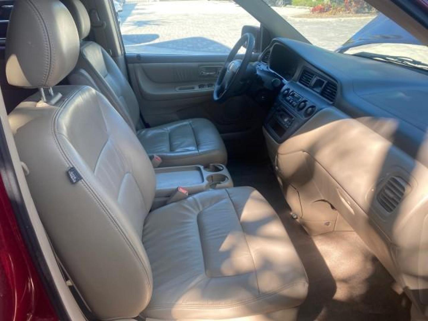 2004 Redrock Pearl /Ivory Honda Odyssey EX-L 1 OWNER FL LOW MILES 59,680 (5FNRL18994B) with an 3.5L SOHC MPFI 24-Valve VTEC V6 Engine engine, Automatic transmission, located at 4701 North Dixie Hwy, Pompano Beach, FL, 33064, (954) 422-2889, 26.240938, -80.123474 - OUR WEBPAGE FLORIDACARS1.COM HAS OVER 100 PHOTOS AND FREE CARFAX LINK 2004 HONDA ODYSSEY EX-L NO RECALLS VIN: 5FNRL18994B039314 5 F N R L 1 8 9 9 4 B 0 3 9 3 1 4 VAN 3.5L V6 F SOHC GASOLINE FRONT WHEEL DRIVE Alloy Wheels Quad Seats Fold-Away Third Row Rear Air Conditioning Leather Seats Third Row Se - Photo#98
