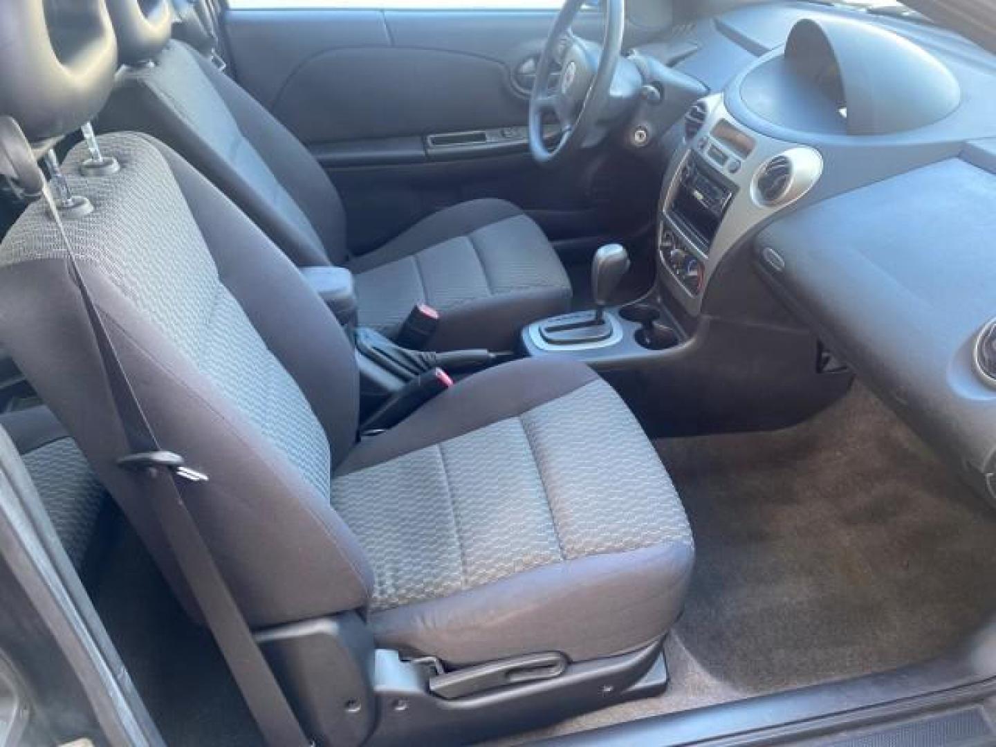 2007 Storm Gray /Black Saturn Ion 3 DR COUPE 1 OWNER FL LO MI 35,356 (1G8AN15F37Z) with an 2.2L DOHC MFI 16-Valve I4 Ecotec Engine engine, Automatic transmission, located at 4701 North Dixie Hwy, Pompano Beach, FL, 33064, (954) 422-2889, 26.240938, -80.123474 - OUR WEBPAGE FLORIDACARS1.COM HAS OVER 100 PHOTOS AND FREE CARFAX LINK VIN: 1G8AN15F37Z152136 1 G 8 A N 1 5 F 3 7 Z 1 5 2 1 3 6 COUPE 4 DR 2.2L I4 F GASOLINE 32 MPG FRONT WHEEL DRIVE Highlighted Features AM/FM Stereo Auxiliary Audio Input Power Locks Rear Defroster Air Conditioning CD Audio Power Mir - Photo#12