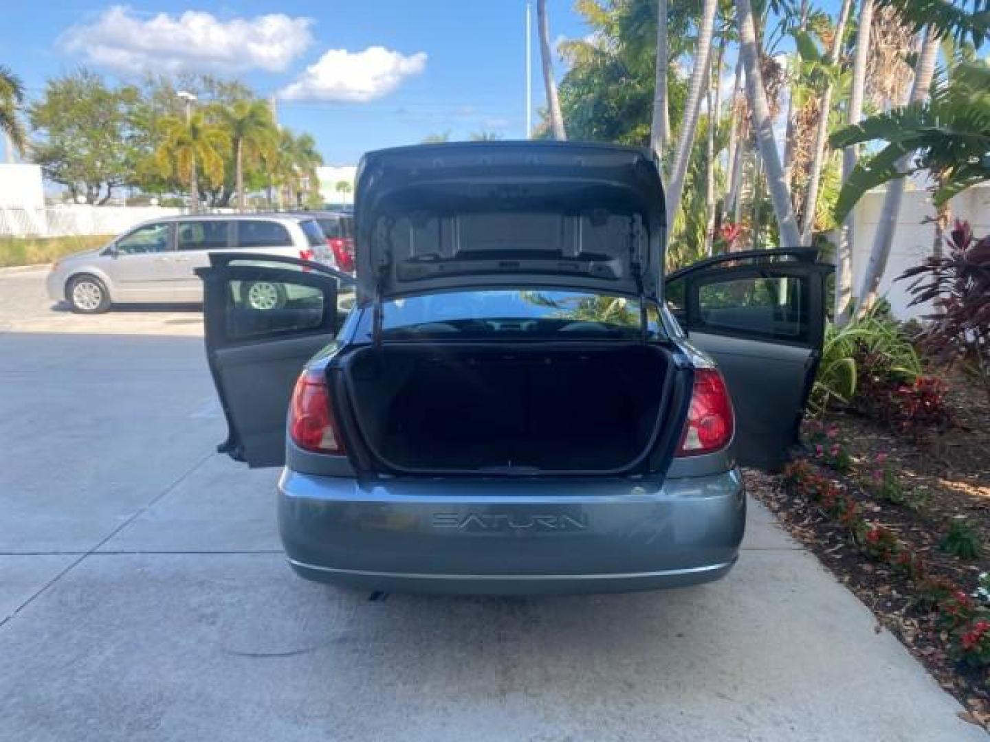2007 Storm Gray /Black Saturn Ion 3 DR COUPE 1 OWNER FL LO MI 35,356 (1G8AN15F37Z) with an 2.2L DOHC MFI 16-Valve I4 Ecotec Engine engine, Automatic transmission, located at 4701 North Dixie Hwy, Pompano Beach, FL, 33064, (954) 422-2889, 26.240938, -80.123474 - OUR WEBPAGE FLORIDACARS1.COM HAS OVER 100 PHOTOS AND FREE CARFAX LINK VIN: 1G8AN15F37Z152136 1 G 8 A N 1 5 F 3 7 Z 1 5 2 1 3 6 COUPE 4 DR 2.2L I4 F GASOLINE 32 MPG FRONT WHEEL DRIVE Highlighted Features AM/FM Stereo Auxiliary Audio Input Power Locks Rear Defroster Air Conditioning CD Audio Power Mir - Photo#15