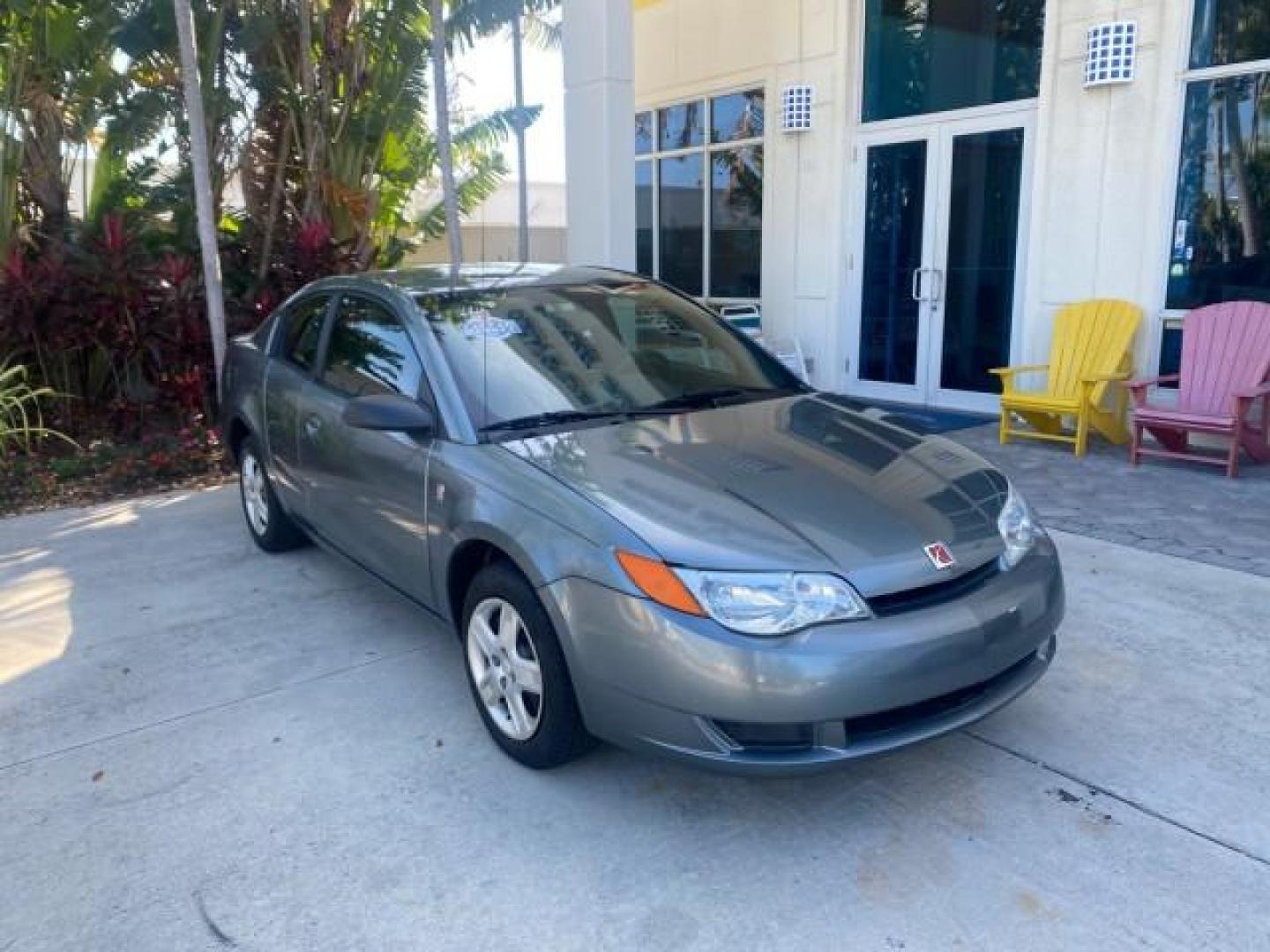 2007 Storm Gray /Black Saturn Ion 3 DR COUPE 1 OWNER FL LO MI 35,356 (1G8AN15F37Z) with an 2.2L DOHC MFI 16-Valve I4 Ecotec Engine engine, Automatic transmission, located at 4701 North Dixie Hwy, Pompano Beach, FL, 33064, (954) 422-2889, 26.240938, -80.123474 - OUR WEBPAGE FLORIDACARS1.COM HAS OVER 100 PHOTOS AND FREE CARFAX LINK VIN: 1G8AN15F37Z152136 1 G 8 A N 1 5 F 3 7 Z 1 5 2 1 3 6 COUPE 4 DR 2.2L I4 F GASOLINE 32 MPG FRONT WHEEL DRIVE Highlighted Features AM/FM Stereo Auxiliary Audio Input Power Locks Rear Defroster Air Conditioning CD Audio Power Mir - Photo#1