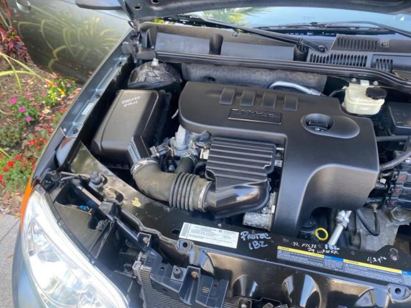 2007 Storm Gray /Black Saturn Ion 3 DR COUPE 1 OWNER FL LO MI 35,356 (1G8AN15F37Z) with an 2.2L DOHC MFI 16-Valve I4 Ecotec Engine engine, Automatic transmission, located at 4701 North Dixie Hwy, Pompano Beach, FL, 33064, (954) 422-2889, 26.240938, -80.123474 - OUR WEBPAGE FLORIDACARS1.COM HAS OVER 100 PHOTOS AND FREE CARFAX LINK VIN: 1G8AN15F37Z152136 1 G 8 A N 1 5 F 3 7 Z 1 5 2 1 3 6 COUPE 4 DR 2.2L I4 F GASOLINE 32 MPG FRONT WHEEL DRIVE Highlighted Features AM/FM Stereo Auxiliary Audio Input Power Locks Rear Defroster Air Conditioning CD Audio Power Mir - Photo#24