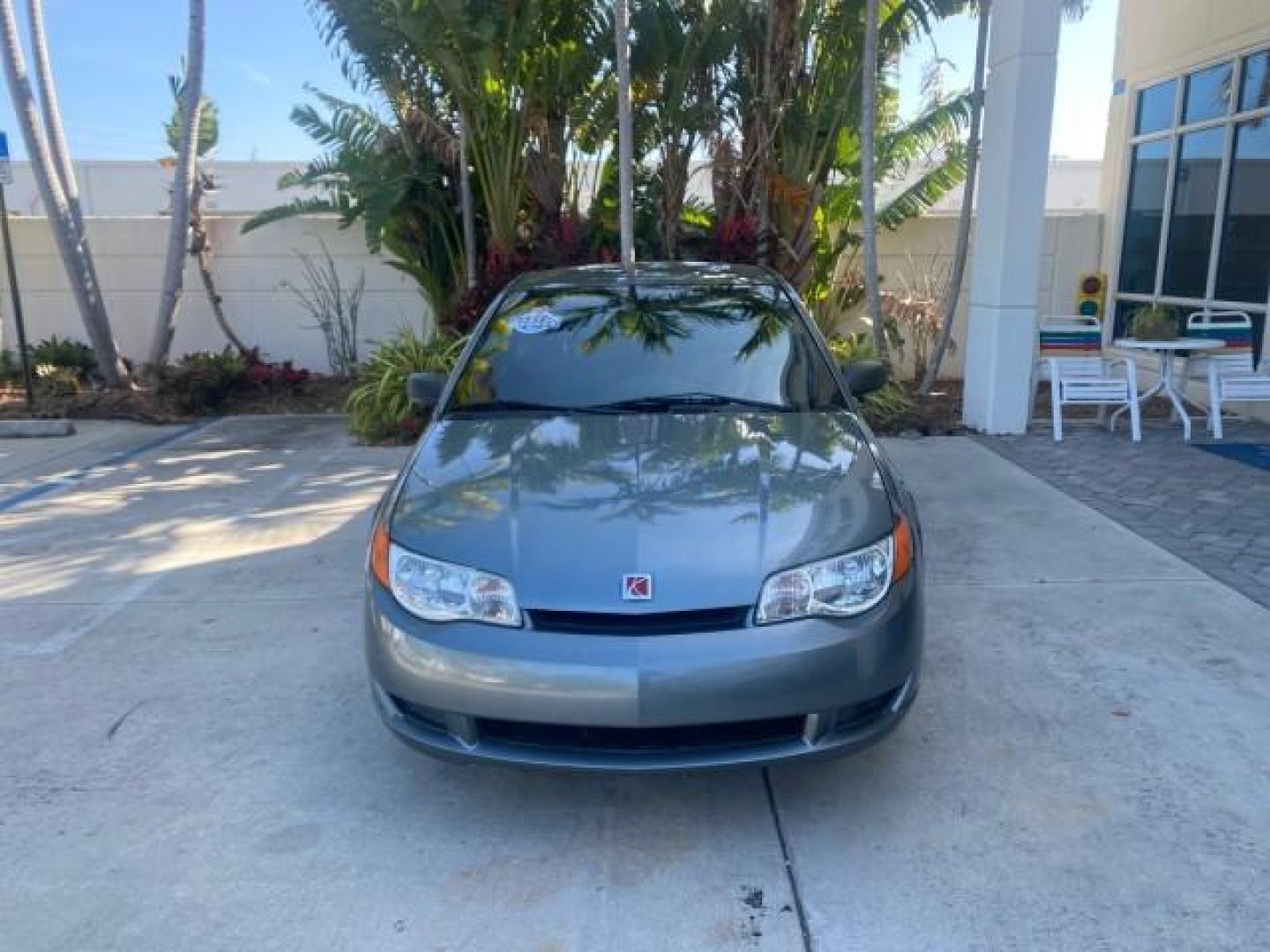 2007 Storm Gray /Black Saturn Ion 3 DR COUPE 1 OWNER FL LO MI 35,356 (1G8AN15F37Z) with an 2.2L DOHC MFI 16-Valve I4 Ecotec Engine engine, Automatic transmission, located at 4701 North Dixie Hwy, Pompano Beach, FL, 33064, (954) 422-2889, 26.240938, -80.123474 - OUR WEBPAGE FLORIDACARS1.COM HAS OVER 100 PHOTOS AND FREE CARFAX LINK VIN: 1G8AN15F37Z152136 1 G 8 A N 1 5 F 3 7 Z 1 5 2 1 3 6 COUPE 4 DR 2.2L I4 F GASOLINE 32 MPG FRONT WHEEL DRIVE Highlighted Features AM/FM Stereo Auxiliary Audio Input Power Locks Rear Defroster Air Conditioning CD Audio Power Mir - Photo#2