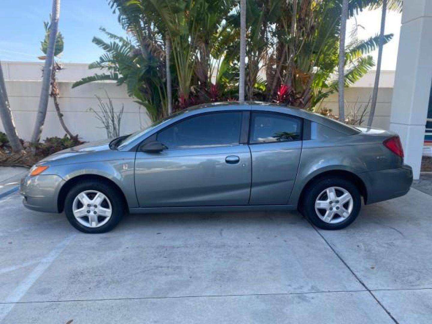 2007 Storm Gray /Black Saturn Ion 3 DR COUPE 1 OWNER FL LO MI 35,356 (1G8AN15F37Z) with an 2.2L DOHC MFI 16-Valve I4 Ecotec Engine engine, Automatic transmission, located at 4701 North Dixie Hwy, Pompano Beach, FL, 33064, (954) 422-2889, 26.240938, -80.123474 - OUR WEBPAGE FLORIDACARS1.COM HAS OVER 100 PHOTOS AND FREE CARFAX LINK VIN: 1G8AN15F37Z152136 1 G 8 A N 1 5 F 3 7 Z 1 5 2 1 3 6 COUPE 4 DR 2.2L I4 F GASOLINE 32 MPG FRONT WHEEL DRIVE Highlighted Features AM/FM Stereo Auxiliary Audio Input Power Locks Rear Defroster Air Conditioning CD Audio Power Mir - Photo#4