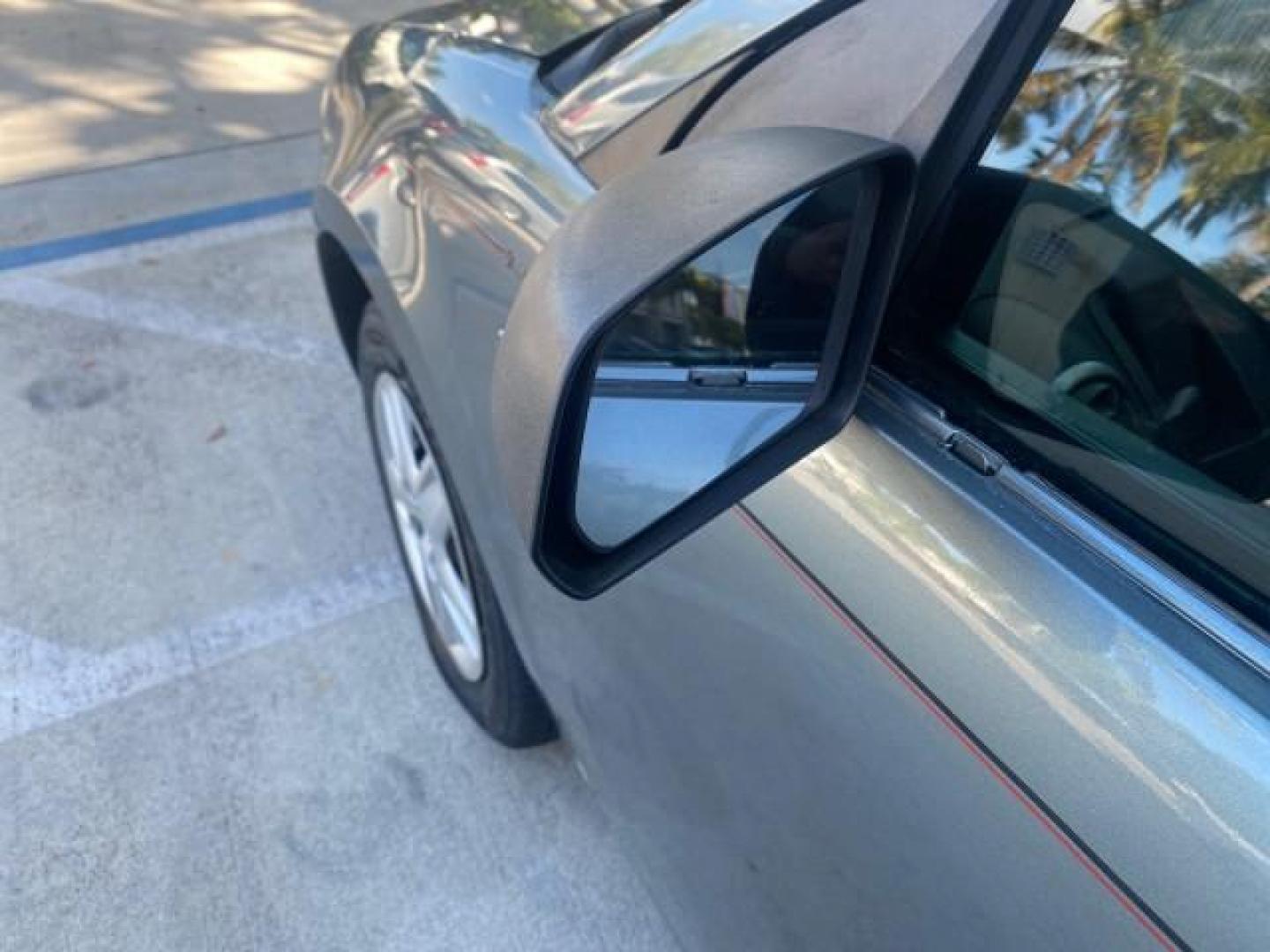 2007 Storm Gray /Black Saturn Ion 3 DR COUPE 1 OWNER FL LO MI 35,356 (1G8AN15F37Z) with an 2.2L DOHC MFI 16-Valve I4 Ecotec Engine engine, Automatic transmission, located at 4701 North Dixie Hwy, Pompano Beach, FL, 33064, (954) 422-2889, 26.240938, -80.123474 - OUR WEBPAGE FLORIDACARS1.COM HAS OVER 100 PHOTOS AND FREE CARFAX LINK VIN: 1G8AN15F37Z152136 1 G 8 A N 1 5 F 3 7 Z 1 5 2 1 3 6 COUPE 4 DR 2.2L I4 F GASOLINE 32 MPG FRONT WHEEL DRIVE Highlighted Features AM/FM Stereo Auxiliary Audio Input Power Locks Rear Defroster Air Conditioning CD Audio Power Mir - Photo#49