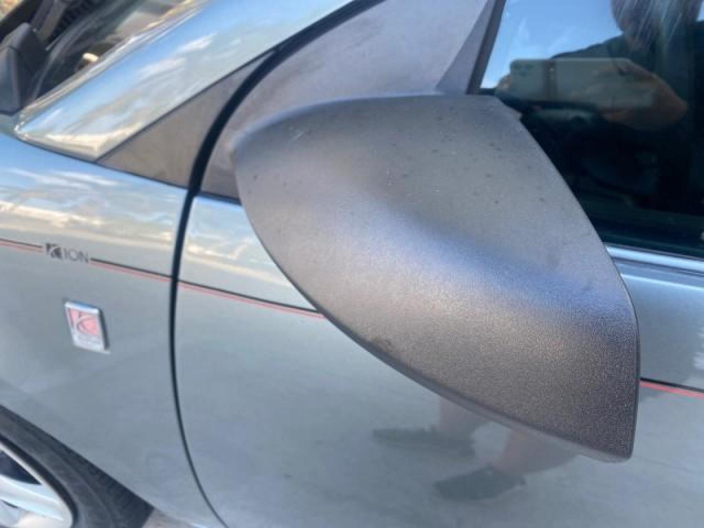 2007 Storm Gray /Black Saturn Ion 3 DR COUPE 1 OWNER FL LO MI 35,356 (1G8AN15F37Z) with an 2.2L DOHC MFI 16-Valve I4 Ecotec Engine engine, Automatic transmission, located at 4701 North Dixie Hwy, Pompano Beach, FL, 33064, (954) 422-2889, 26.240938, -80.123474 - OUR WEBPAGE FLORIDACARS1.COM HAS OVER 100 PHOTOS AND FREE CARFAX LINK VIN: 1G8AN15F37Z152136 1 G 8 A N 1 5 F 3 7 Z 1 5 2 1 3 6 COUPE 4 DR 2.2L I4 F GASOLINE 32 MPG FRONT WHEEL DRIVE Highlighted Features AM/FM Stereo Auxiliary Audio Input Power Locks Rear Defroster Air Conditioning CD Audio Power Mir - Photo#50