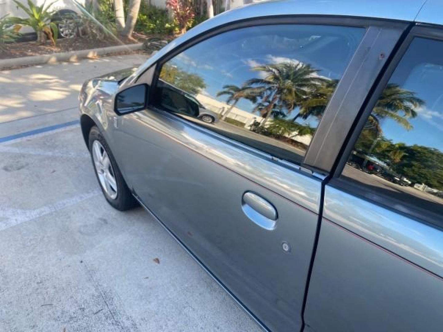 2007 Storm Gray /Black Saturn Ion 3 DR COUPE 1 OWNER FL LO MI 35,356 (1G8AN15F37Z) with an 2.2L DOHC MFI 16-Valve I4 Ecotec Engine engine, Automatic transmission, located at 4701 North Dixie Hwy, Pompano Beach, FL, 33064, (954) 422-2889, 26.240938, -80.123474 - OUR WEBPAGE FLORIDACARS1.COM HAS OVER 100 PHOTOS AND FREE CARFAX LINK VIN: 1G8AN15F37Z152136 1 G 8 A N 1 5 F 3 7 Z 1 5 2 1 3 6 COUPE 4 DR 2.2L I4 F GASOLINE 32 MPG FRONT WHEEL DRIVE Highlighted Features AM/FM Stereo Auxiliary Audio Input Power Locks Rear Defroster Air Conditioning CD Audio Power Mir - Photo#51