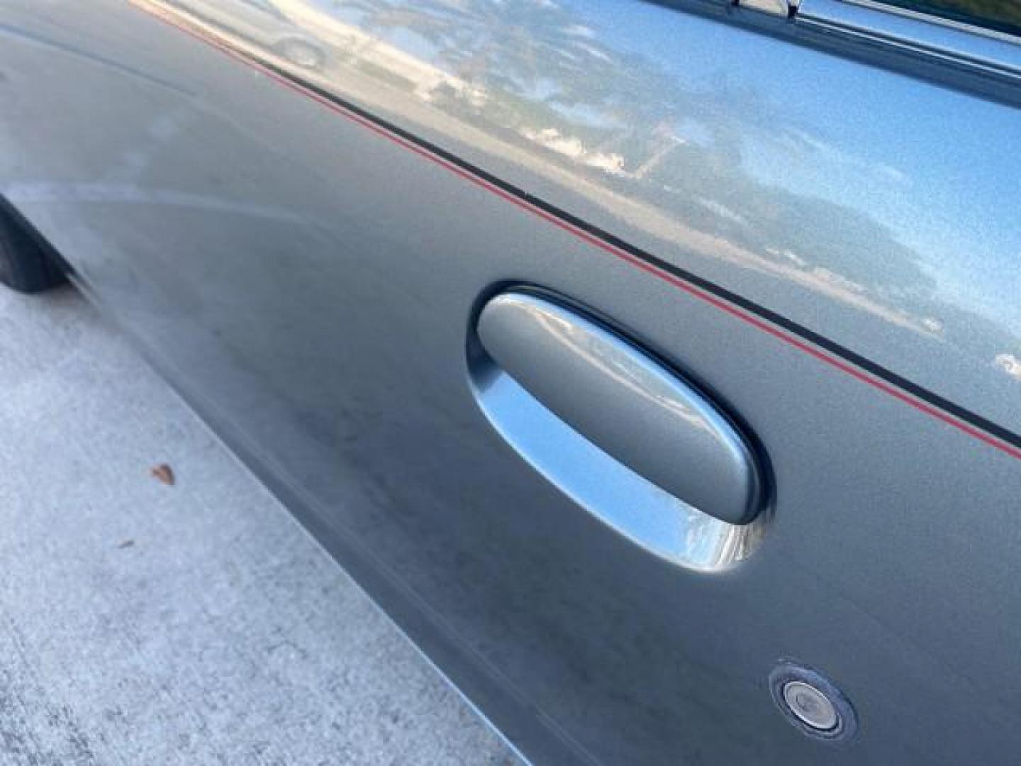 2007 Storm Gray /Black Saturn Ion 3 DR COUPE 1 OWNER FL LO MI 35,356 (1G8AN15F37Z) with an 2.2L DOHC MFI 16-Valve I4 Ecotec Engine engine, Automatic transmission, located at 4701 North Dixie Hwy, Pompano Beach, FL, 33064, (954) 422-2889, 26.240938, -80.123474 - OUR WEBPAGE FLORIDACARS1.COM HAS OVER 100 PHOTOS AND FREE CARFAX LINK VIN: 1G8AN15F37Z152136 1 G 8 A N 1 5 F 3 7 Z 1 5 2 1 3 6 COUPE 4 DR 2.2L I4 F GASOLINE 32 MPG FRONT WHEEL DRIVE Highlighted Features AM/FM Stereo Auxiliary Audio Input Power Locks Rear Defroster Air Conditioning CD Audio Power Mir - Photo#52
