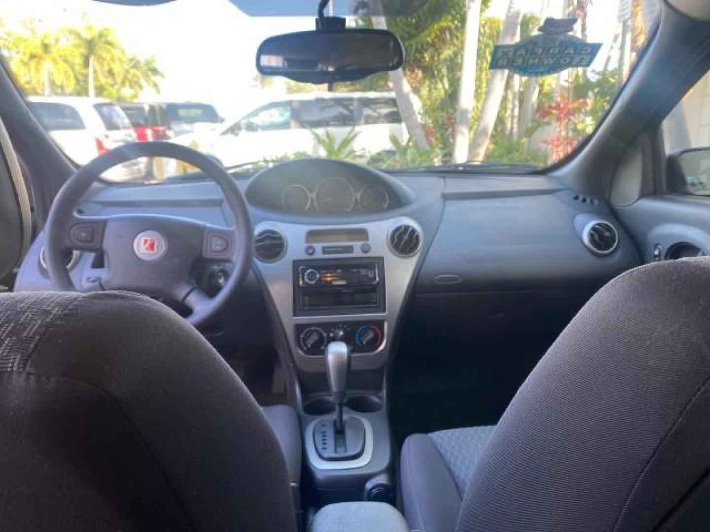 2007 Storm Gray /Black Saturn Ion 3 DR COUPE 1 OWNER FL LO MI 35,356 (1G8AN15F37Z) with an 2.2L DOHC MFI 16-Valve I4 Ecotec Engine engine, Automatic transmission, located at 4701 North Dixie Hwy, Pompano Beach, FL, 33064, (954) 422-2889, 26.240938, -80.123474 - OUR WEBPAGE FLORIDACARS1.COM HAS OVER 100 PHOTOS AND FREE CARFAX LINK VIN: 1G8AN15F37Z152136 1 G 8 A N 1 5 F 3 7 Z 1 5 2 1 3 6 COUPE 4 DR 2.2L I4 F GASOLINE 32 MPG FRONT WHEEL DRIVE Highlighted Features AM/FM Stereo Auxiliary Audio Input Power Locks Rear Defroster Air Conditioning CD Audio Power Mir - Photo#58