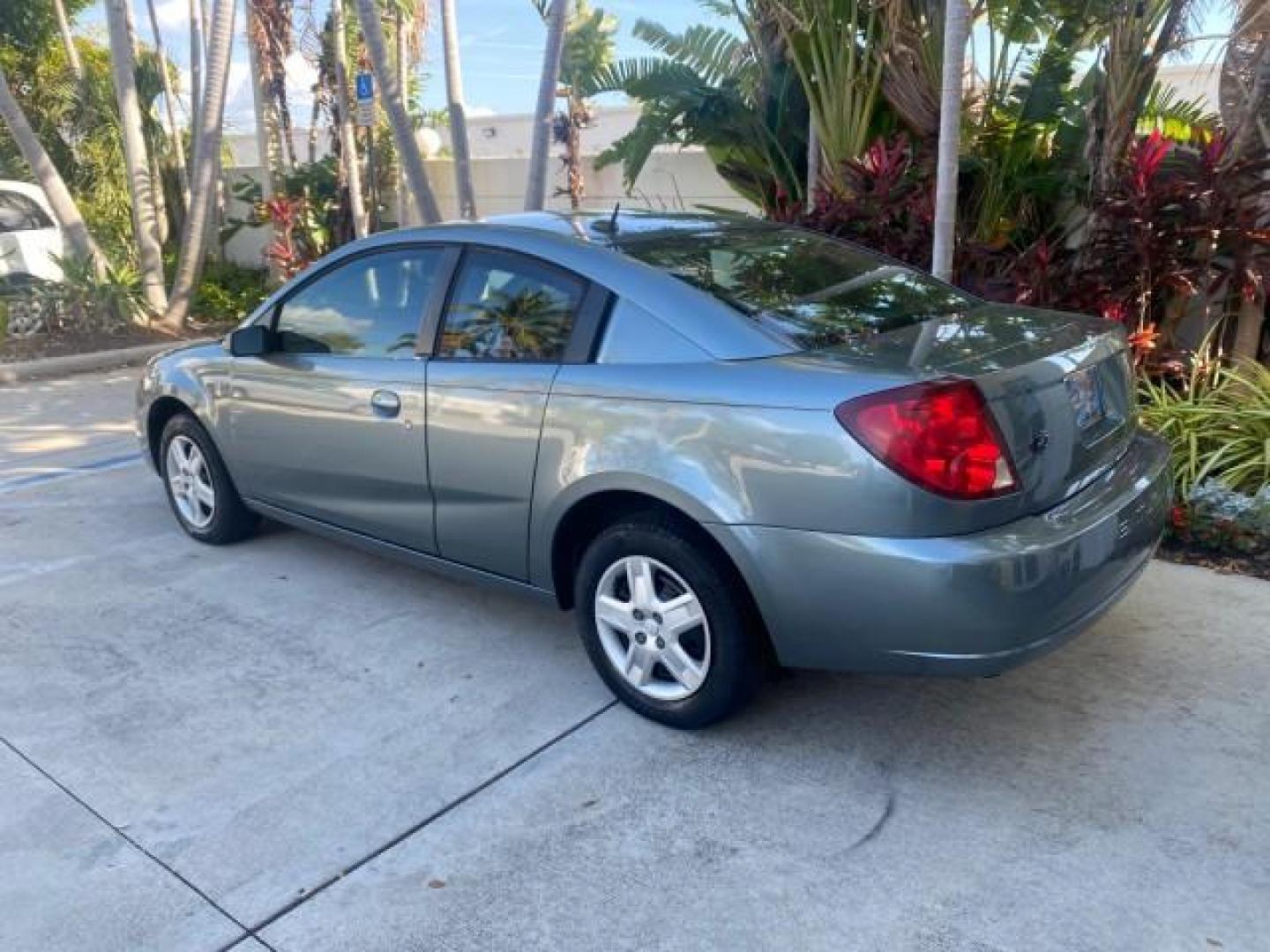 2007 Storm Gray /Black Saturn Ion 3 DR COUPE 1 OWNER FL LO MI 35,356 (1G8AN15F37Z) with an 2.2L DOHC MFI 16-Valve I4 Ecotec Engine engine, Automatic transmission, located at 4701 North Dixie Hwy, Pompano Beach, FL, 33064, (954) 422-2889, 26.240938, -80.123474 - OUR WEBPAGE FLORIDACARS1.COM HAS OVER 100 PHOTOS AND FREE CARFAX LINK VIN: 1G8AN15F37Z152136 1 G 8 A N 1 5 F 3 7 Z 1 5 2 1 3 6 COUPE 4 DR 2.2L I4 F GASOLINE 32 MPG FRONT WHEEL DRIVE Highlighted Features AM/FM Stereo Auxiliary Audio Input Power Locks Rear Defroster Air Conditioning CD Audio Power Mir - Photo#5