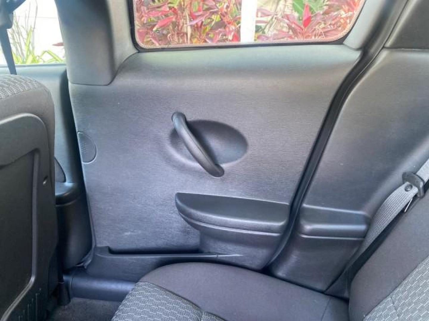 2007 Storm Gray /Black Saturn Ion 3 DR COUPE 1 OWNER FL LO MI 35,356 (1G8AN15F37Z) with an 2.2L DOHC MFI 16-Valve I4 Ecotec Engine engine, Automatic transmission, located at 4701 North Dixie Hwy, Pompano Beach, FL, 33064, (954) 422-2889, 26.240938, -80.123474 - OUR WEBPAGE FLORIDACARS1.COM HAS OVER 100 PHOTOS AND FREE CARFAX LINK VIN: 1G8AN15F37Z152136 1 G 8 A N 1 5 F 3 7 Z 1 5 2 1 3 6 COUPE 4 DR 2.2L I4 F GASOLINE 32 MPG FRONT WHEEL DRIVE Highlighted Features AM/FM Stereo Auxiliary Audio Input Power Locks Rear Defroster Air Conditioning CD Audio Power Mir - Photo#63