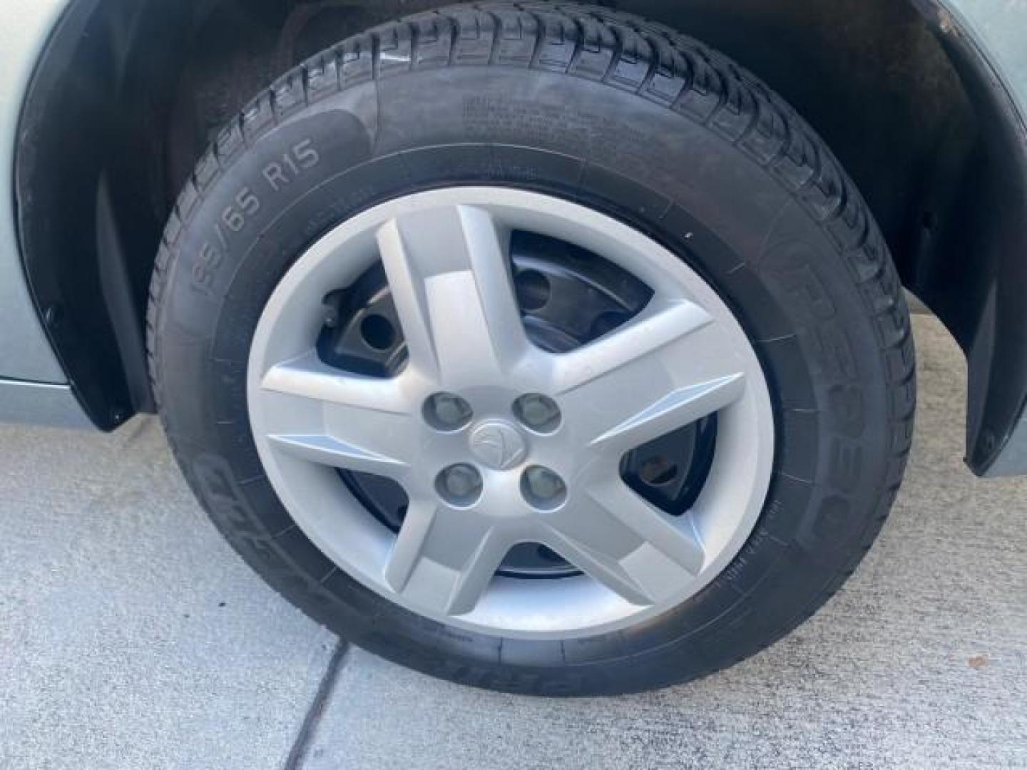 2007 Storm Gray /Black Saturn Ion 3 DR COUPE 1 OWNER FL LO MI 35,356 (1G8AN15F37Z) with an 2.2L DOHC MFI 16-Valve I4 Ecotec Engine engine, Automatic transmission, located at 4701 North Dixie Hwy, Pompano Beach, FL, 33064, (954) 422-2889, 26.240938, -80.123474 - OUR WEBPAGE FLORIDACARS1.COM HAS OVER 100 PHOTOS AND FREE CARFAX LINK VIN: 1G8AN15F37Z152136 1 G 8 A N 1 5 F 3 7 Z 1 5 2 1 3 6 COUPE 4 DR 2.2L I4 F GASOLINE 32 MPG FRONT WHEEL DRIVE Highlighted Features AM/FM Stereo Auxiliary Audio Input Power Locks Rear Defroster Air Conditioning CD Audio Power Mir - Photo#67