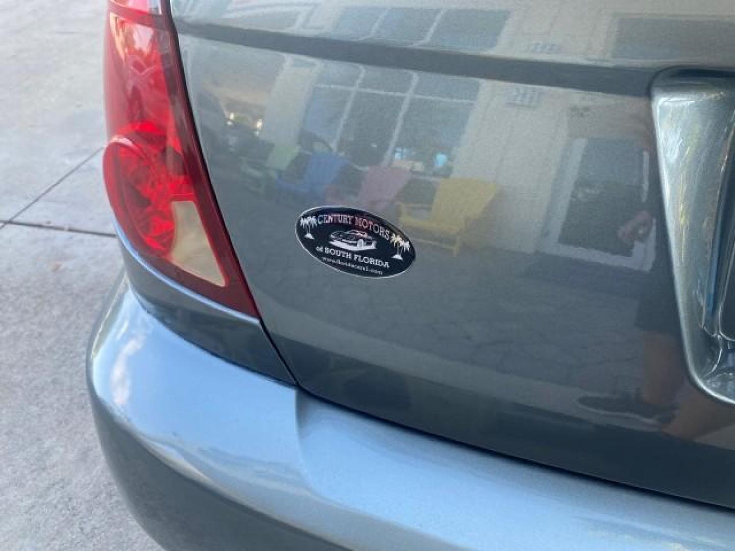 2007 Storm Gray /Black Saturn Ion 3 DR COUPE 1 OWNER FL LO MI 35,356 (1G8AN15F37Z) with an 2.2L DOHC MFI 16-Valve I4 Ecotec Engine engine, Automatic transmission, located at 4701 North Dixie Hwy, Pompano Beach, FL, 33064, (954) 422-2889, 26.240938, -80.123474 - OUR WEBPAGE FLORIDACARS1.COM HAS OVER 100 PHOTOS AND FREE CARFAX LINK VIN: 1G8AN15F37Z152136 1 G 8 A N 1 5 F 3 7 Z 1 5 2 1 3 6 COUPE 4 DR 2.2L I4 F GASOLINE 32 MPG FRONT WHEEL DRIVE Highlighted Features AM/FM Stereo Auxiliary Audio Input Power Locks Rear Defroster Air Conditioning CD Audio Power Mir - Photo#71