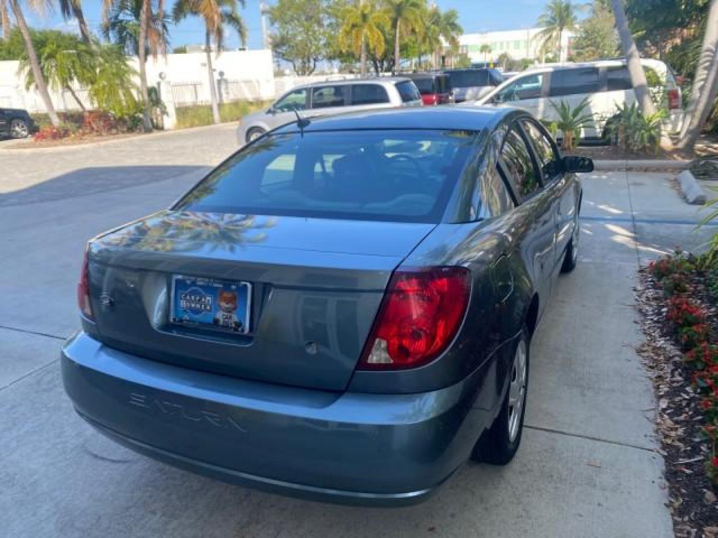 2007 Storm Gray /Black Saturn Ion 3 DR COUPE 1 OWNER FL LO MI 35,356 (1G8AN15F37Z) with an 2.2L DOHC MFI 16-Valve I4 Ecotec Engine engine, Automatic transmission, located at 4701 North Dixie Hwy, Pompano Beach, FL, 33064, (954) 422-2889, 26.240938, -80.123474 - OUR WEBPAGE FLORIDACARS1.COM HAS OVER 100 PHOTOS AND FREE CARFAX LINK VIN: 1G8AN15F37Z152136 1 G 8 A N 1 5 F 3 7 Z 1 5 2 1 3 6 COUPE 4 DR 2.2L I4 F GASOLINE 32 MPG FRONT WHEEL DRIVE Highlighted Features AM/FM Stereo Auxiliary Audio Input Power Locks Rear Defroster Air Conditioning CD Audio Power Mir - Photo#7