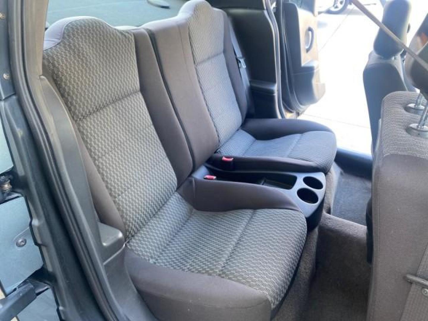 2007 Storm Gray /Black Saturn Ion 3 DR COUPE 1 OWNER FL LO MI 35,356 (1G8AN15F37Z) with an 2.2L DOHC MFI 16-Valve I4 Ecotec Engine engine, Automatic transmission, located at 4701 North Dixie Hwy, Pompano Beach, FL, 33064, (954) 422-2889, 26.240938, -80.123474 - OUR WEBPAGE FLORIDACARS1.COM HAS OVER 100 PHOTOS AND FREE CARFAX LINK VIN: 1G8AN15F37Z152136 1 G 8 A N 1 5 F 3 7 Z 1 5 2 1 3 6 COUPE 4 DR 2.2L I4 F GASOLINE 32 MPG FRONT WHEEL DRIVE Highlighted Features AM/FM Stereo Auxiliary Audio Input Power Locks Rear Defroster Air Conditioning CD Audio Power Mir - Photo#81