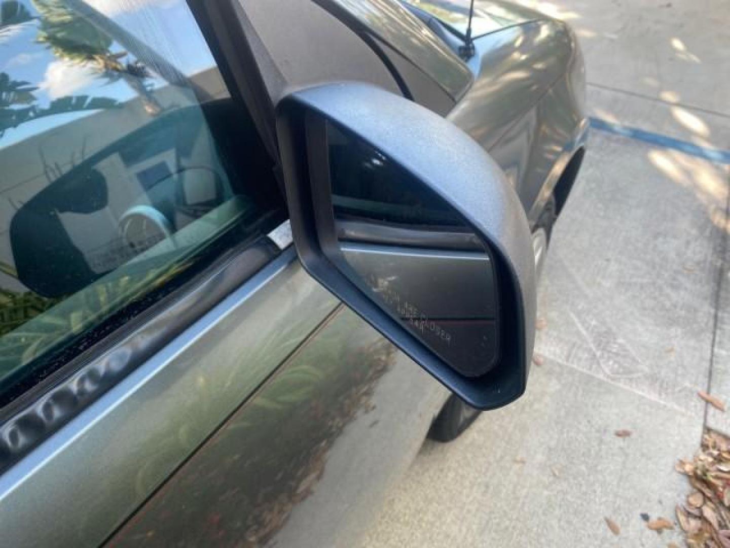 2007 Storm Gray /Black Saturn Ion 3 DR COUPE 1 OWNER FL LO MI 35,356 (1G8AN15F37Z) with an 2.2L DOHC MFI 16-Valve I4 Ecotec Engine engine, Automatic transmission, located at 4701 North Dixie Hwy, Pompano Beach, FL, 33064, (954) 422-2889, 26.240938, -80.123474 - OUR WEBPAGE FLORIDACARS1.COM HAS OVER 100 PHOTOS AND FREE CARFAX LINK VIN: 1G8AN15F37Z152136 1 G 8 A N 1 5 F 3 7 Z 1 5 2 1 3 6 COUPE 4 DR 2.2L I4 F GASOLINE 32 MPG FRONT WHEEL DRIVE Highlighted Features AM/FM Stereo Auxiliary Audio Input Power Locks Rear Defroster Air Conditioning CD Audio Power Mir - Photo#88