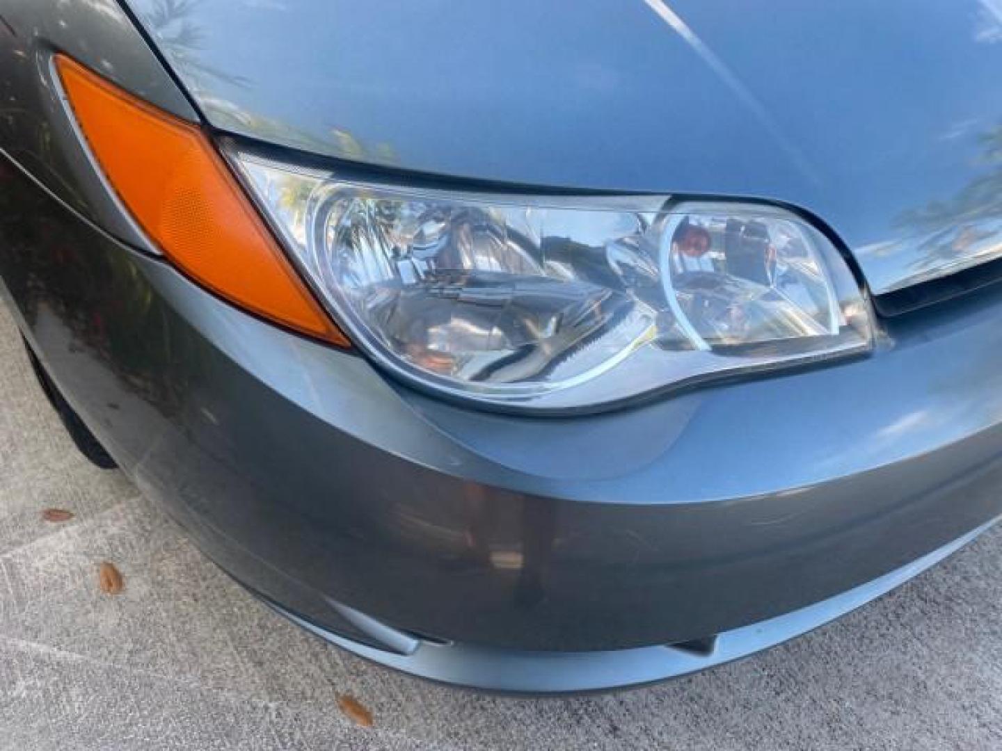 2007 Storm Gray /Black Saturn Ion 3 DR COUPE 1 OWNER FL LO MI 35,356 (1G8AN15F37Z) with an 2.2L DOHC MFI 16-Valve I4 Ecotec Engine engine, Automatic transmission, located at 4701 North Dixie Hwy, Pompano Beach, FL, 33064, (954) 422-2889, 26.240938, -80.123474 - OUR WEBPAGE FLORIDACARS1.COM HAS OVER 100 PHOTOS AND FREE CARFAX LINK VIN: 1G8AN15F37Z152136 1 G 8 A N 1 5 F 3 7 Z 1 5 2 1 3 6 COUPE 4 DR 2.2L I4 F GASOLINE 32 MPG FRONT WHEEL DRIVE Highlighted Features AM/FM Stereo Auxiliary Audio Input Power Locks Rear Defroster Air Conditioning CD Audio Power Mir - Photo#94