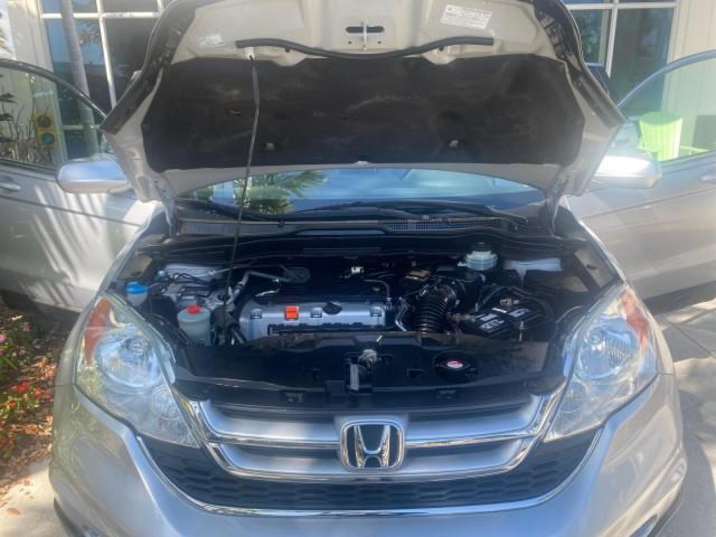 2011 Alabaster Silver Metallic /Gray Honda CR-V EX-L LOW MILES 27,869 (5J6RE3H79BL) with an 2.4L DOHC MPFI 16-Valve i-VTEC I4 Engine engine, Automatic transmission, located at 4701 North Dixie Hwy, Pompano Beach, FL, 33064, (954) 422-2889, 26.240938, -80.123474 - OUR WEBPAGE FLORIDACARS1.COM HAS OVER 100 PHOTOS AND FREE CARFAX LINK 2011 HONDA CR-V EX-L VIN: 5J6RE3H79BL009139 5 J 6 R E 3 H 7 9 B L 0 0 9 1 3 9 4 DOOR WAGON/SPORT UTILITY 2.4L I4 F DOHC 16V GASOLINE 28 MPG FRONT WHEEL DRIVE Top Features Alloy Wheels Running Boards Front Seat Heaters Satellite Ra - Photo#17