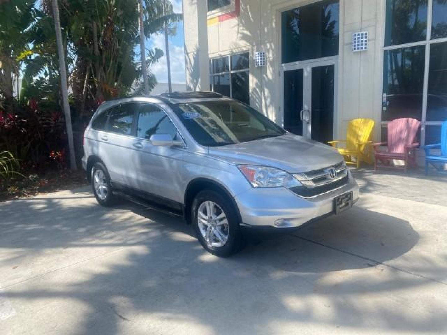 2011 Alabaster Silver Metallic /Gray Honda CR-V EX-L LOW MILES 27,869 (5J6RE3H79BL) with an 2.4L DOHC MPFI 16-Valve i-VTEC I4 Engine engine, Automatic transmission, located at 4701 North Dixie Hwy, Pompano Beach, FL, 33064, (954) 422-2889, 26.240938, -80.123474 - OUR WEBPAGE FLORIDACARS1.COM HAS OVER 100 PHOTOS AND FREE CARFAX LINK 2011 HONDA CR-V EX-L VIN: 5J6RE3H79BL009139 5 J 6 R E 3 H 7 9 B L 0 0 9 1 3 9 4 DOOR WAGON/SPORT UTILITY 2.4L I4 F DOHC 16V GASOLINE 28 MPG FRONT WHEEL DRIVE Top Features Alloy Wheels Running Boards Front Seat Heaters Satellite Ra - Photo#1