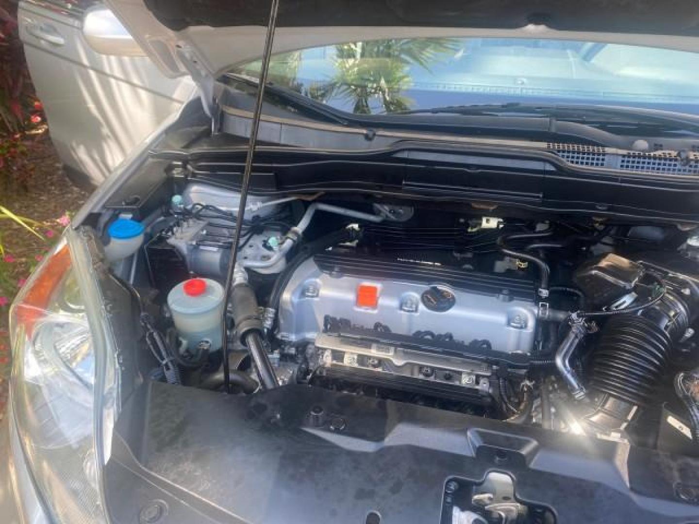 2011 Alabaster Silver Metallic /Gray Honda CR-V EX-L LOW MILES 27,869 (5J6RE3H79BL) with an 2.4L DOHC MPFI 16-Valve i-VTEC I4 Engine engine, Automatic transmission, located at 4701 North Dixie Hwy, Pompano Beach, FL, 33064, (954) 422-2889, 26.240938, -80.123474 - OUR WEBPAGE FLORIDACARS1.COM HAS OVER 100 PHOTOS AND FREE CARFAX LINK 2011 HONDA CR-V EX-L VIN: 5J6RE3H79BL009139 5 J 6 R E 3 H 7 9 B L 0 0 9 1 3 9 4 DOOR WAGON/SPORT UTILITY 2.4L I4 F DOHC 16V GASOLINE 28 MPG FRONT WHEEL DRIVE Top Features Alloy Wheels Running Boards Front Seat Heaters Satellite Ra - Photo#24
