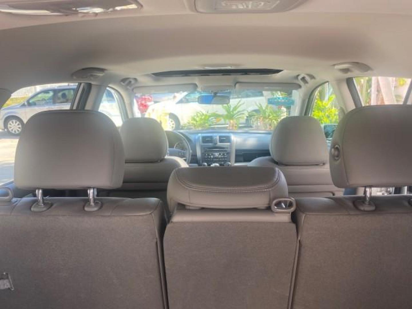 2011 Alabaster Silver Metallic /Gray Honda CR-V EX-L LOW MILES 27,869 (5J6RE3H79BL) with an 2.4L DOHC MPFI 16-Valve i-VTEC I4 Engine engine, Automatic transmission, located at 4701 North Dixie Hwy, Pompano Beach, FL, 33064, (954) 422-2889, 26.240938, -80.123474 - OUR WEBPAGE FLORIDACARS1.COM HAS OVER 100 PHOTOS AND FREE CARFAX LINK 2011 HONDA CR-V EX-L VIN: 5J6RE3H79BL009139 5 J 6 R E 3 H 7 9 B L 0 0 9 1 3 9 4 DOOR WAGON/SPORT UTILITY 2.4L I4 F DOHC 16V GASOLINE 28 MPG FRONT WHEEL DRIVE Top Features Alloy Wheels Running Boards Front Seat Heaters Satellite Ra - Photo#91
