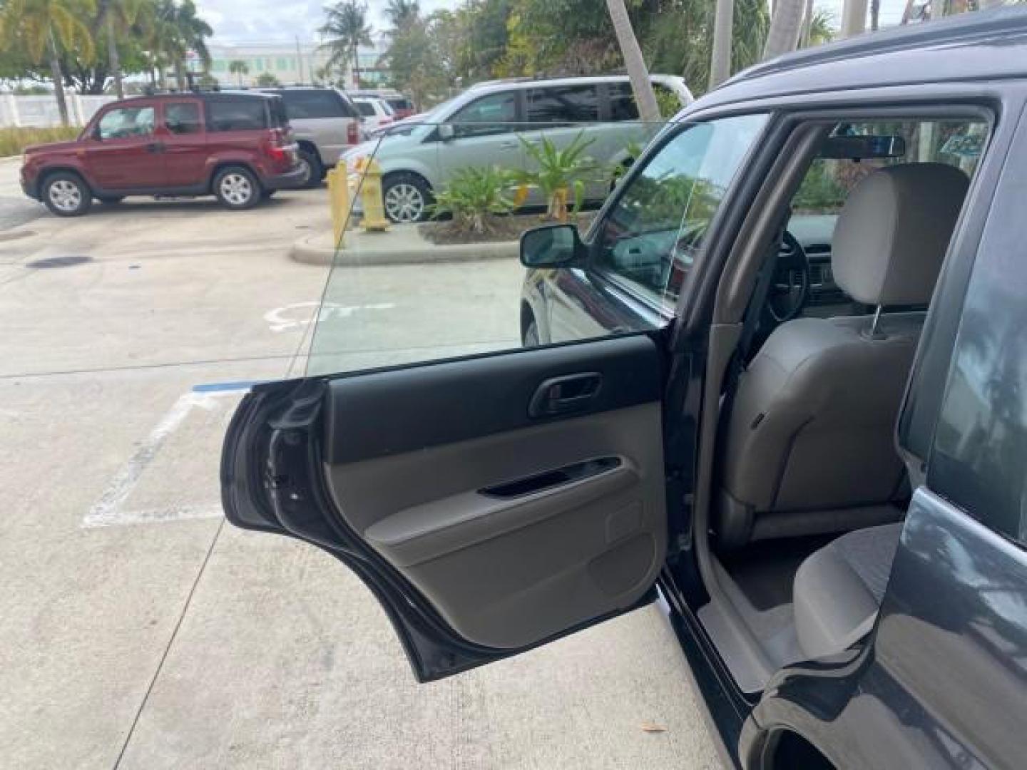 2008 Dark Gray Metallic /Graphite Gray Subaru Forester (Natl) X SW1 OWNER 39 SERVICES AWD (JF1SG63678H) with an 2.5L SOHC SMPI 16-Valve 4-Cyl Boxer Engine engine, Automatic transmission, located at 4701 North Dixie Hwy, Pompano Beach, FL, 33064, (954) 422-2889, 26.240938, -80.123474 - OUR WEBPAGE FLORIDACARS1.COM HAS OVER 100 PHOTOS AND FREE CARFAX LINK 2008 SUBARU FORESTER 2.5 X VIN: JF1SG63678H706067 J F 1 S G 6 3 6 7 8 H 7 0 6 0 6 7 4 DOOR WAGON/SPORT UTILITY 2.5L H4 F SOHC 16V GASOLINE 26 MPG ALL WHEEL DRIVE Highlighted Features ABS Brakes Automatic Transmission Power Locks R - Photo#13