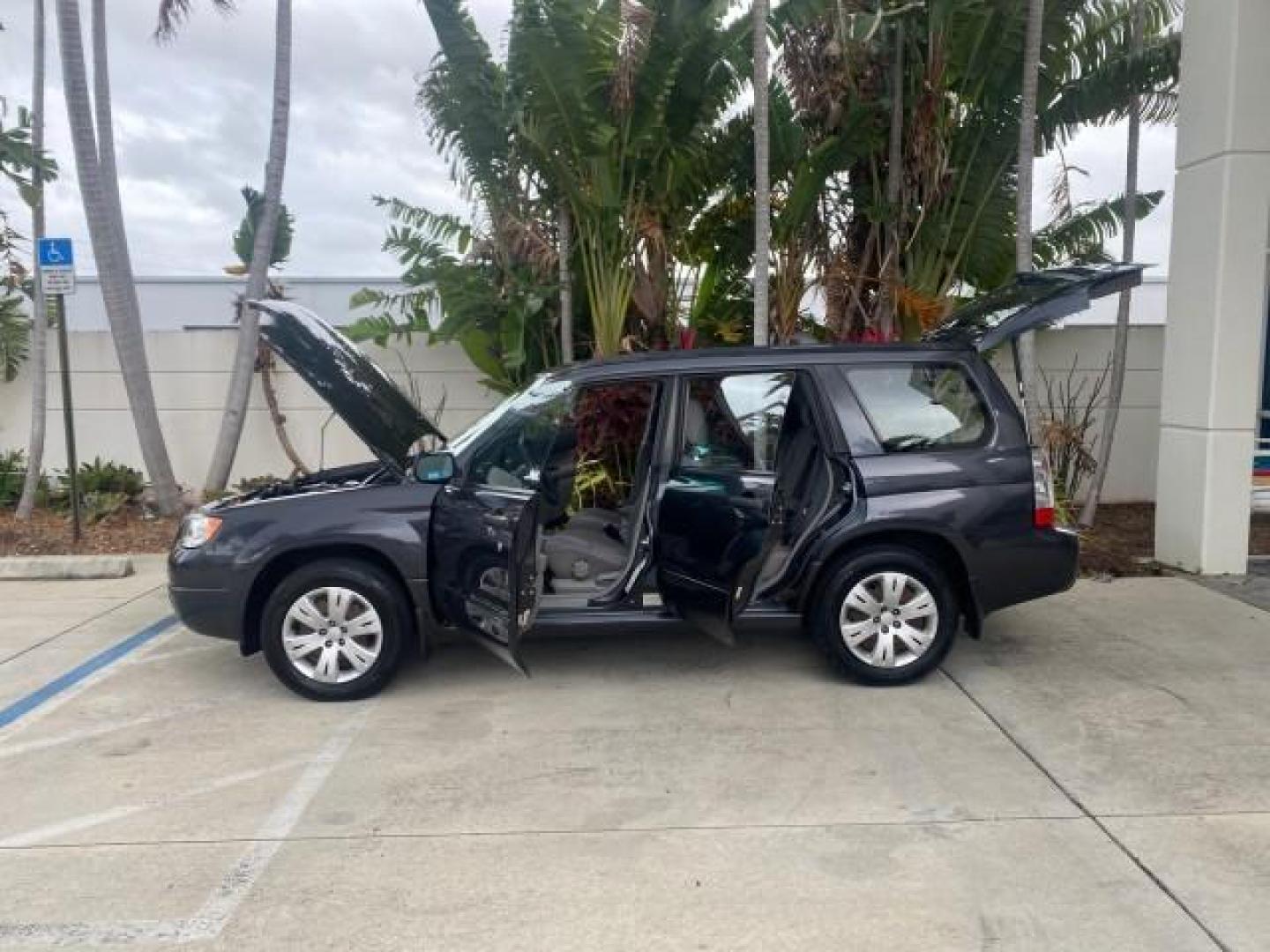 2008 Dark Gray Metallic /Graphite Gray Subaru Forester (Natl) X SW1 OWNER 39 SERVICES AWD (JF1SG63678H) with an 2.5L SOHC SMPI 16-Valve 4-Cyl Boxer Engine engine, Automatic transmission, located at 4701 North Dixie Hwy, Pompano Beach, FL, 33064, (954) 422-2889, 26.240938, -80.123474 - OUR WEBPAGE FLORIDACARS1.COM HAS OVER 100 PHOTOS AND FREE CARFAX LINK 2008 SUBARU FORESTER 2.5 X VIN: JF1SG63678H706067 J F 1 S G 6 3 6 7 8 H 7 0 6 0 6 7 4 DOOR WAGON/SPORT UTILITY 2.5L H4 F SOHC 16V GASOLINE 26 MPG ALL WHEEL DRIVE Highlighted Features ABS Brakes Automatic Transmission Power Locks R - Photo#8