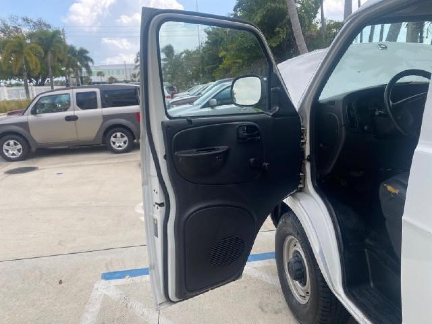 2002 Bright White /Dark Slate Gray Dodge Ram Van EXT 1 OWNER FL LOW MILES 64,774 (2B7KB31Z92K) with an 5.9L MPI V8 Magnum Engine engine, Automatic transmission, located at 4701 North Dixie Hwy, Pompano Beach, FL, 33064, (954) 422-2889, 26.240938, -80.123474 - OUR WEBPAGE FLORIDACARS1.COM HAS OVER 100 PHOTOS AND FREE CARFAX LINK 2002 DODGE RAM VAN 3500 EXT VIN: 2B7KB31Z92K123220 2 B 7 K B 3 1 Z 9 2 K 1 2 3 2 2 0 VAN 5.9L V8 F OHV 16V GASOLINE REAR WHEEL DRIVE Top Features Tow Hitch Vinyl Seats Basic Features ABS Brakes Air Conditioning Cassette Player AM/ - Photo#9